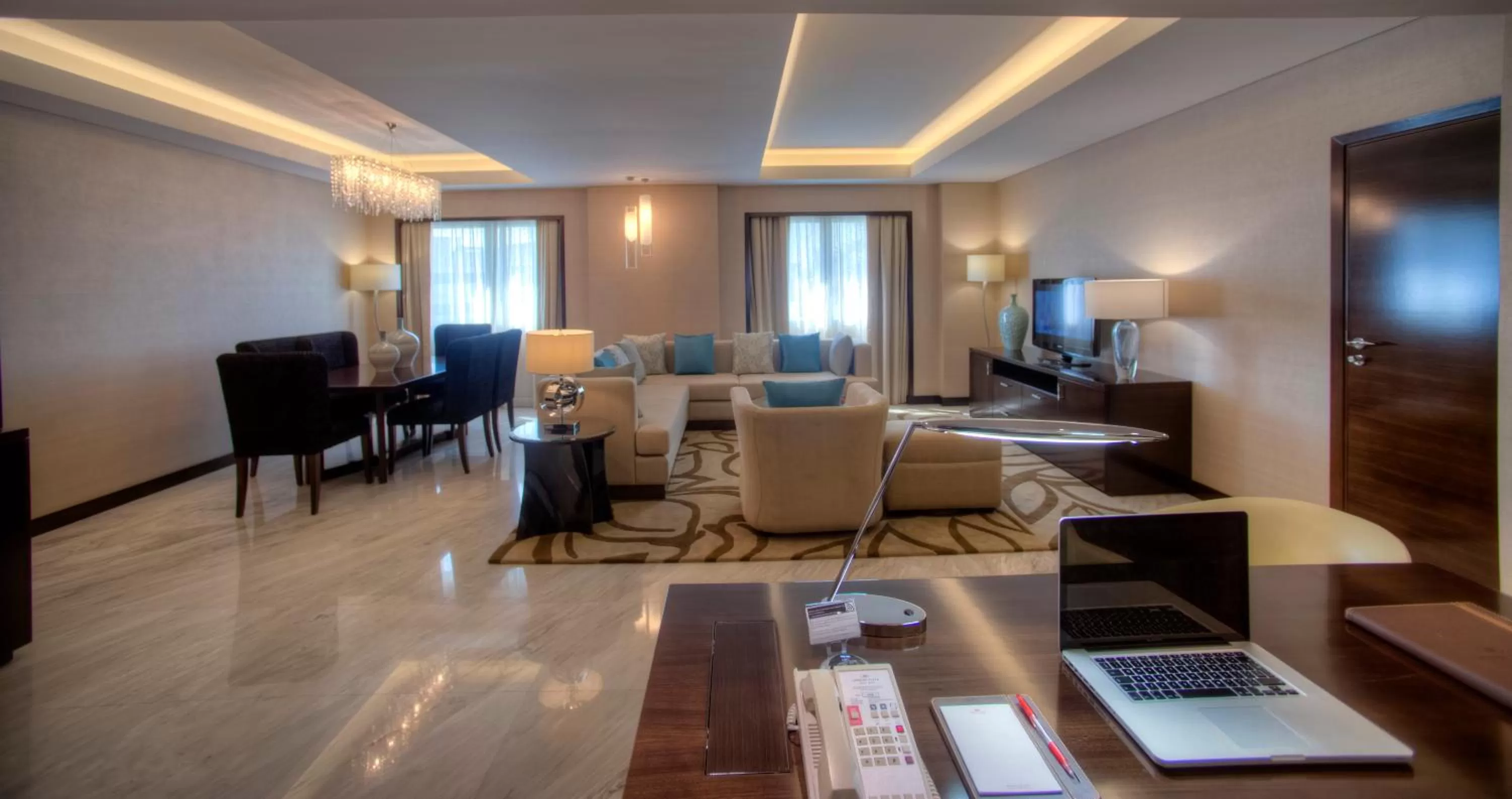 Living room in Crowne Plaza Dubai Deira by IHG