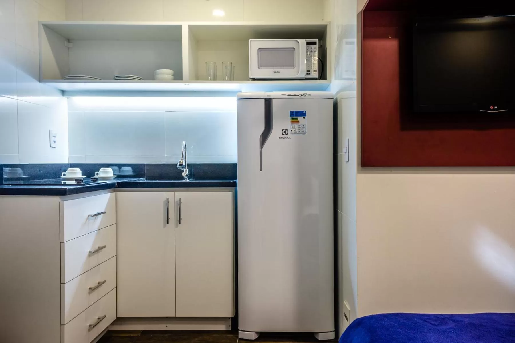 Kitchen or kitchenette, Kitchen/Kitchenette in Injoy Suítes & Aparts