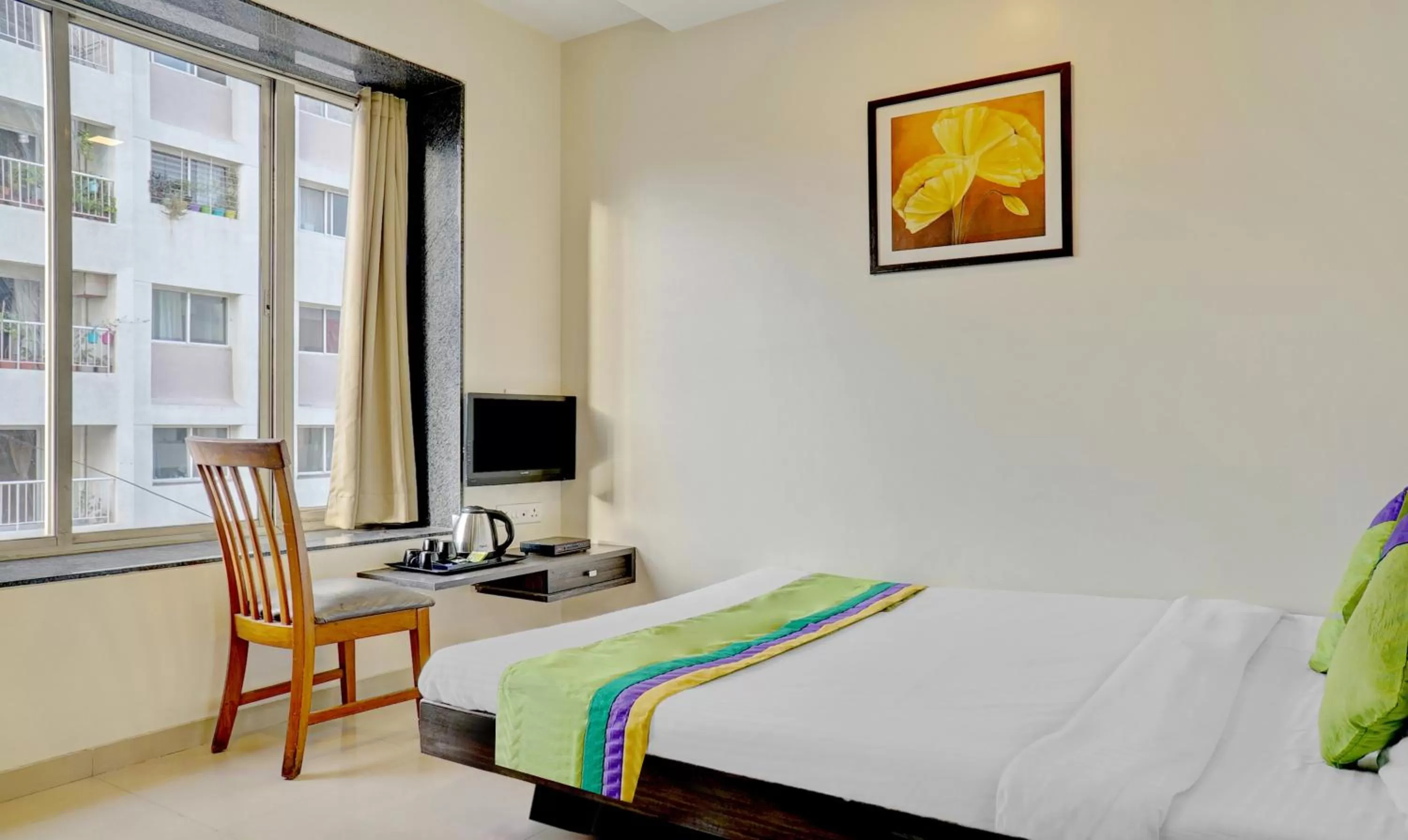 Bedroom, Bed in Treebo Bhagyashree Executive