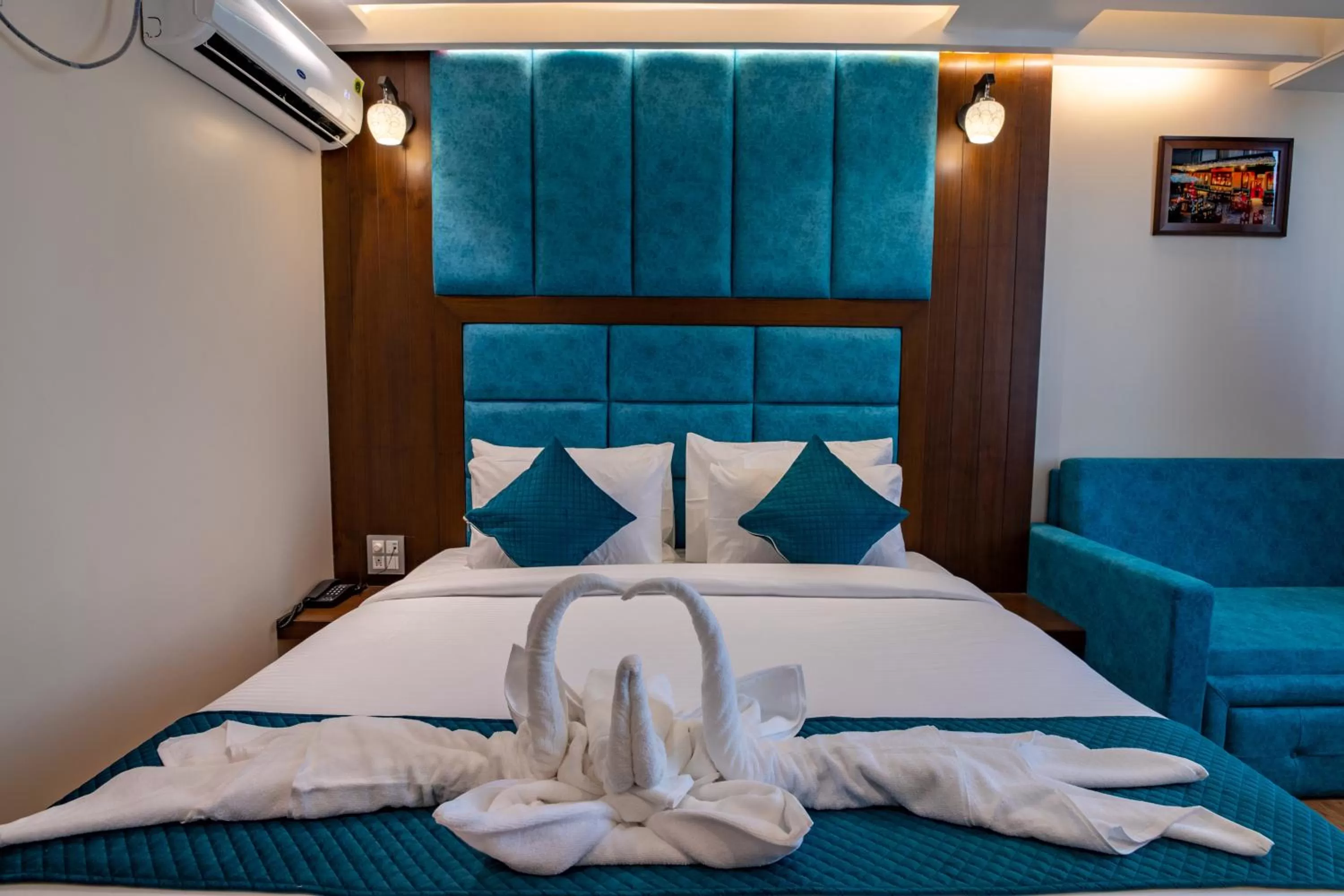 Bed in HOTEL VIVAAN REGENCY