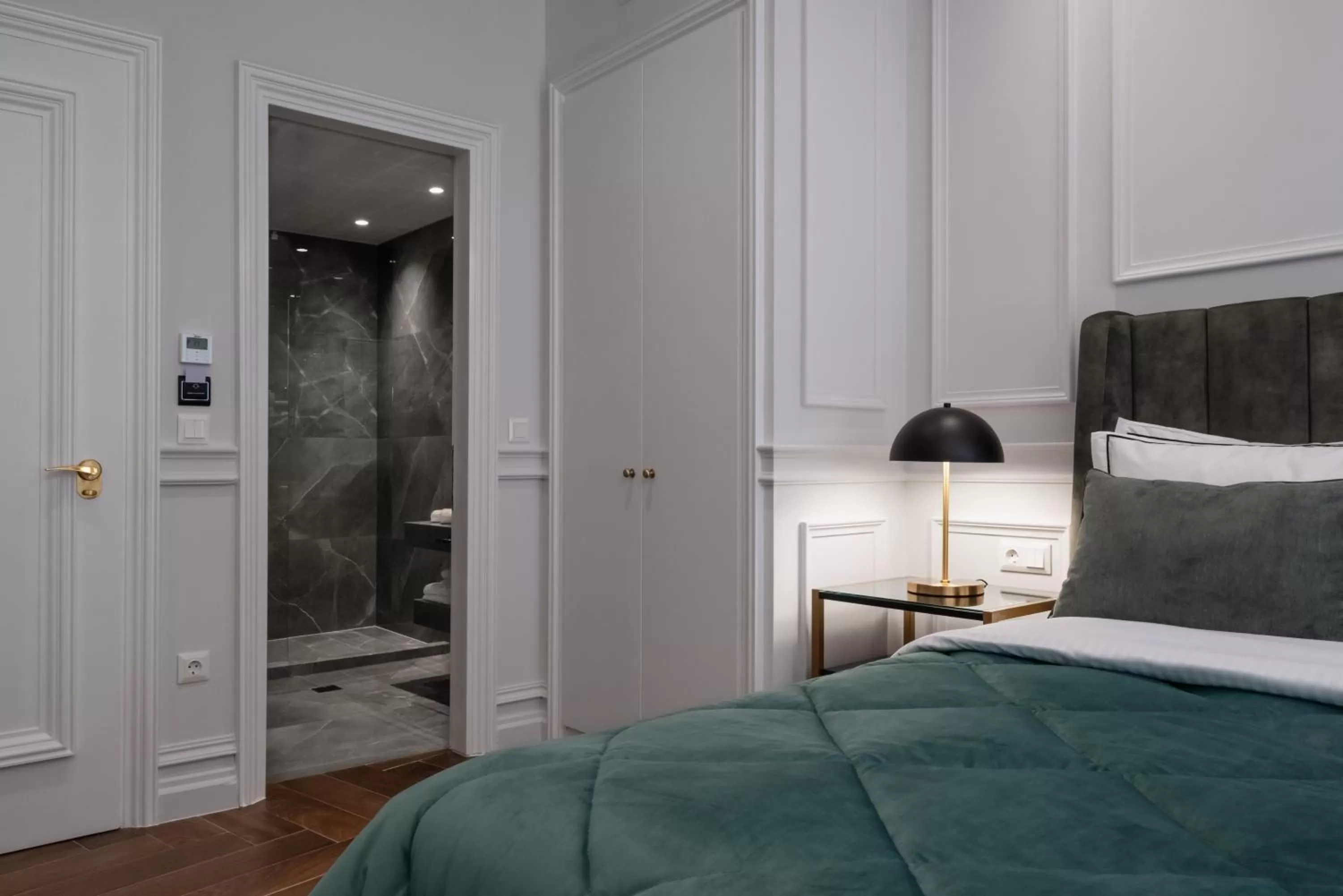 Bed in Praxitelous Luxury Suites