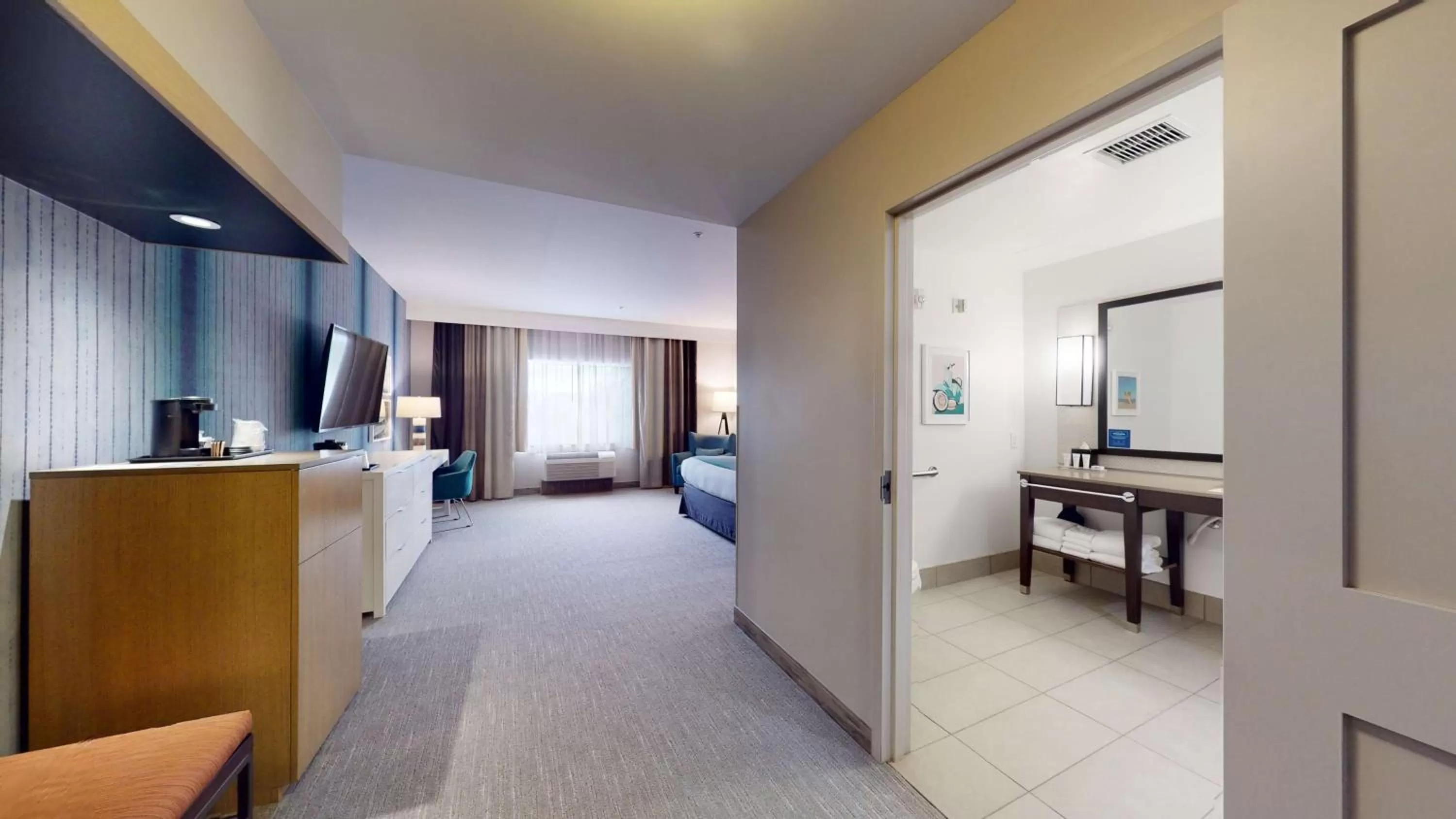 Bathroom, Bed in SunCoast Hotel Anaheim, Tapestry Collection by Hilton