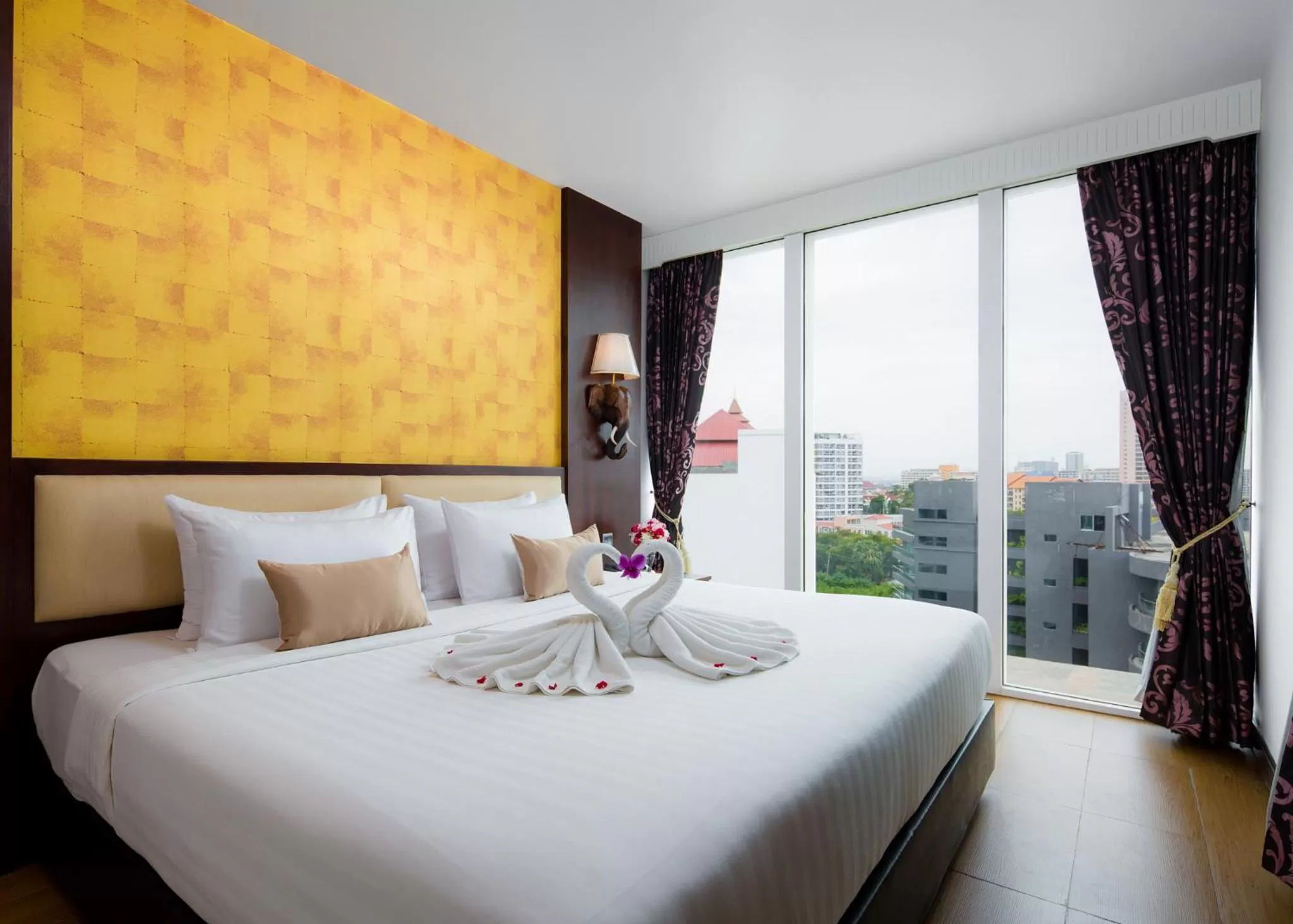 Bed in Aiyara Grand Hotel