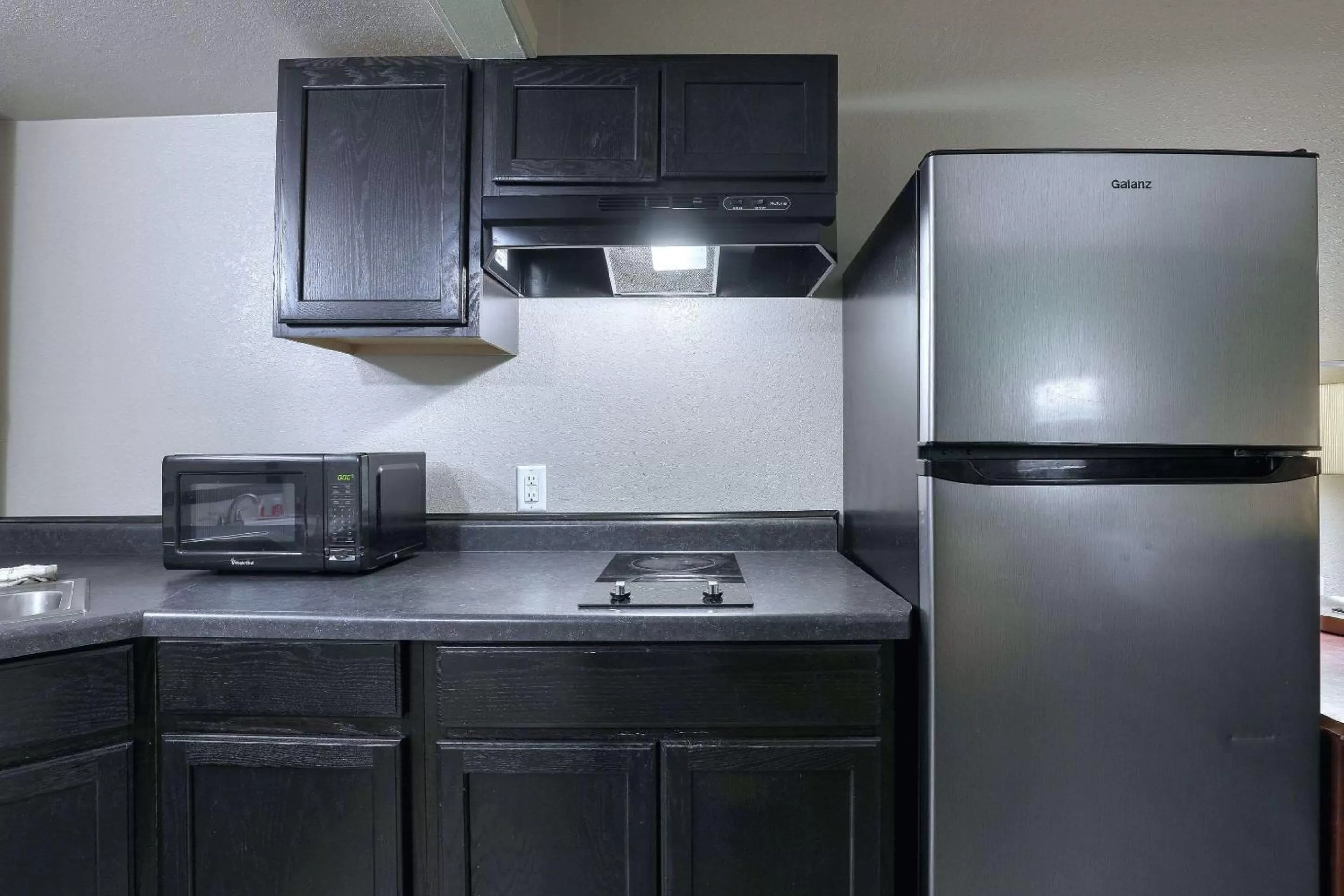 Bedroom in Suburban Studios Neenah-Appleton