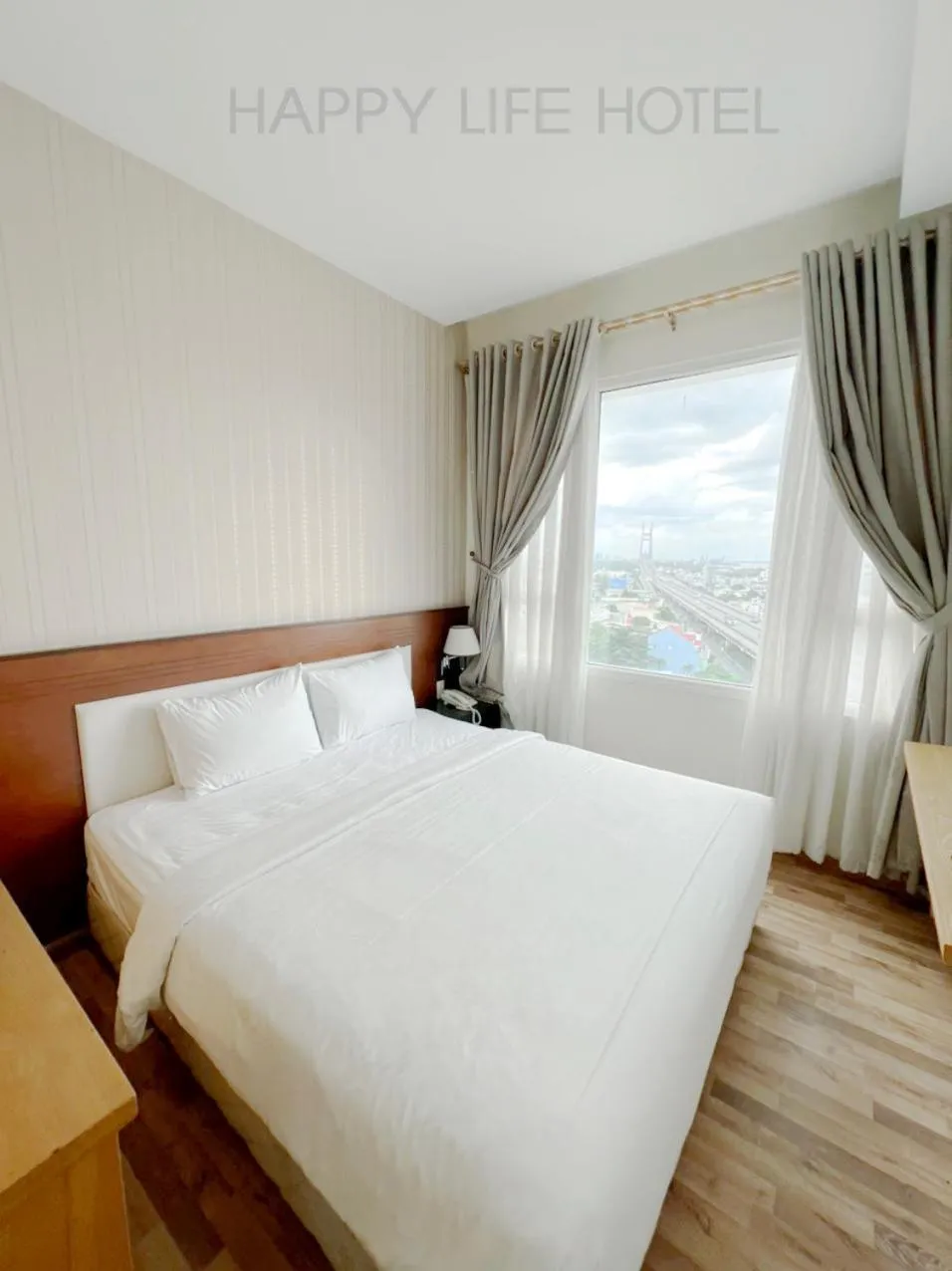 Bed in Happy Life Hotel District 7 Gần SECC