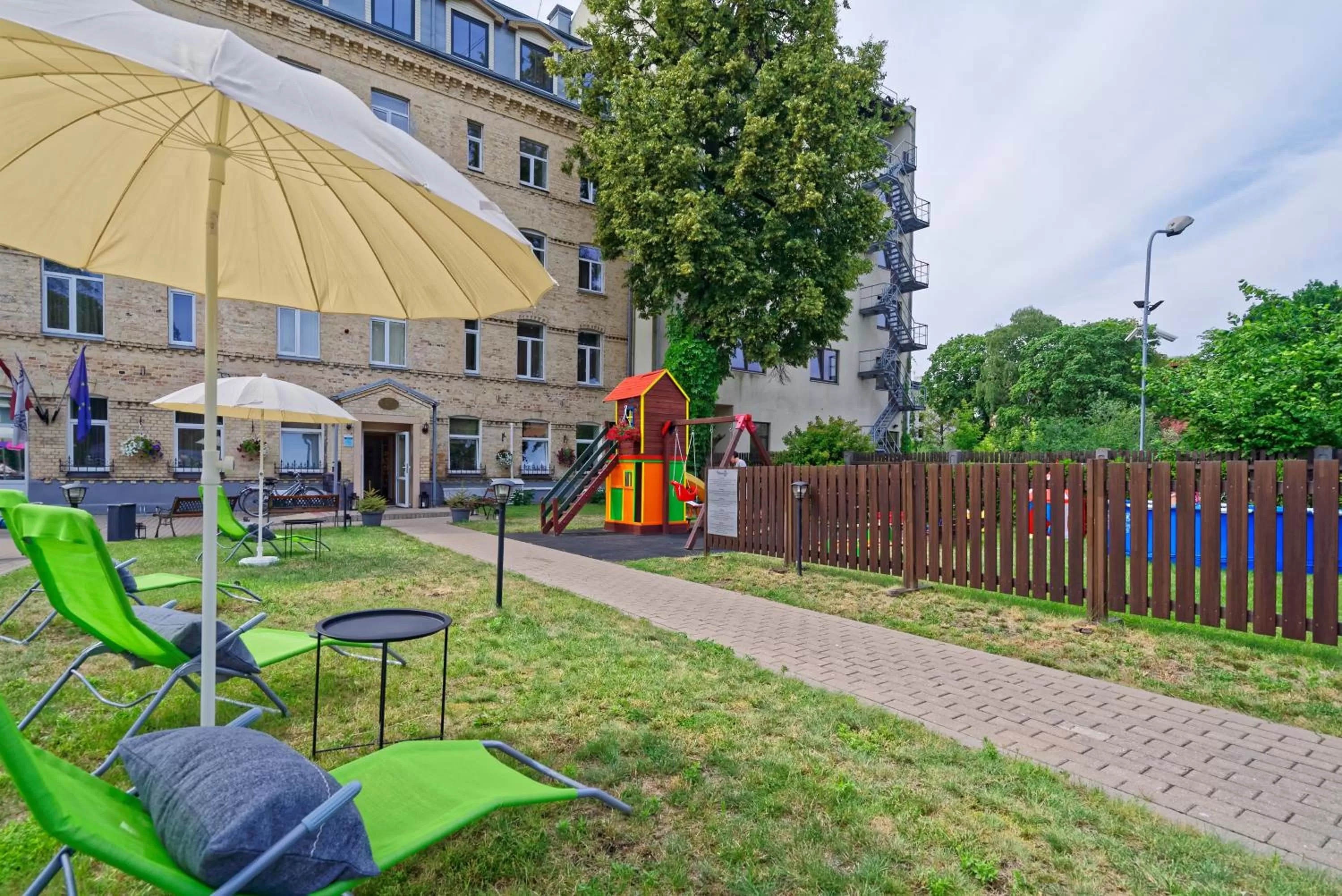 Property building in RIGAAPARTMENT SONADA Self-Service Aparthotel - Private Parking