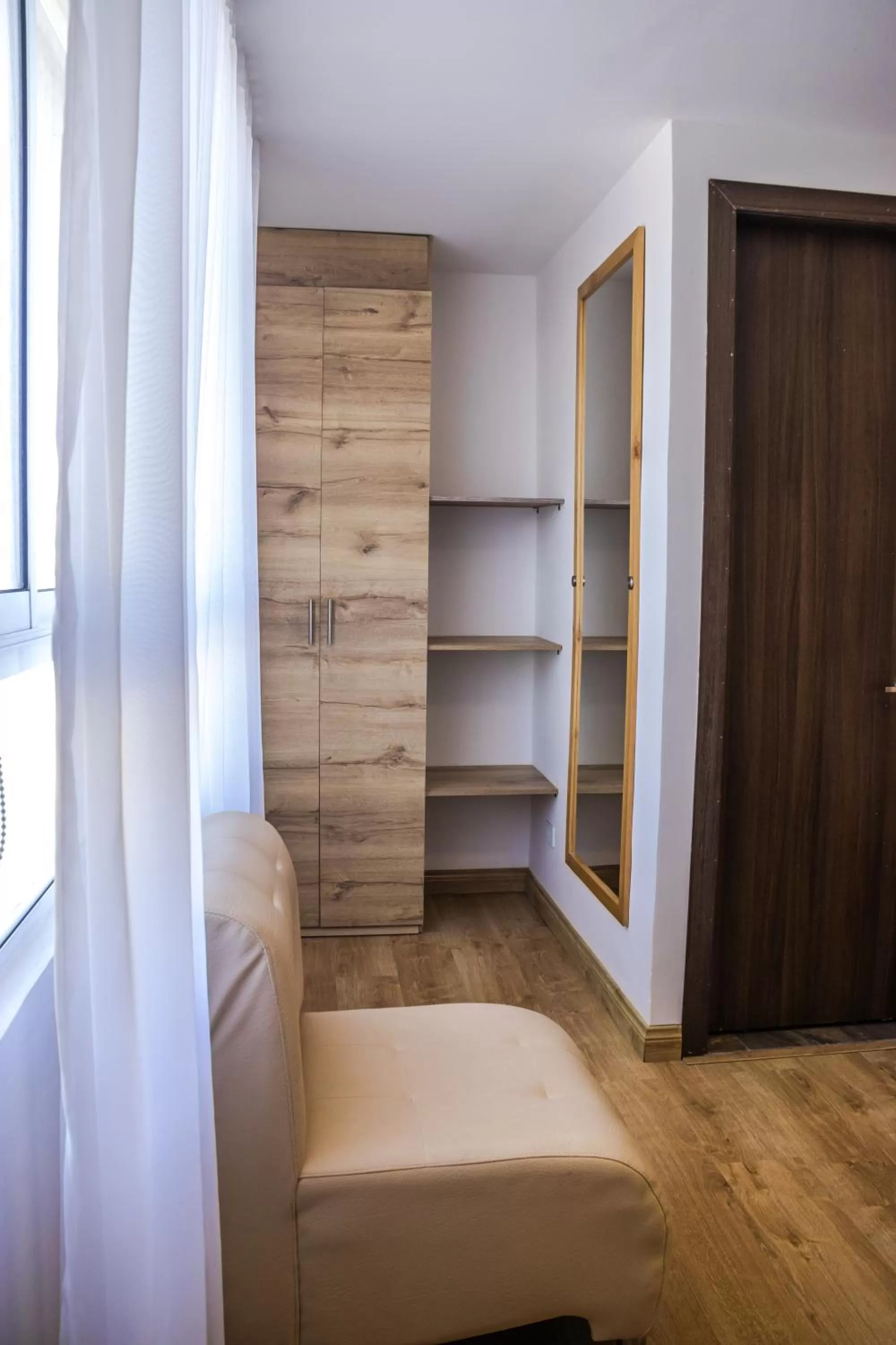 wardrobe, Seating Area in Nogal Suite Hotel Ipiales
