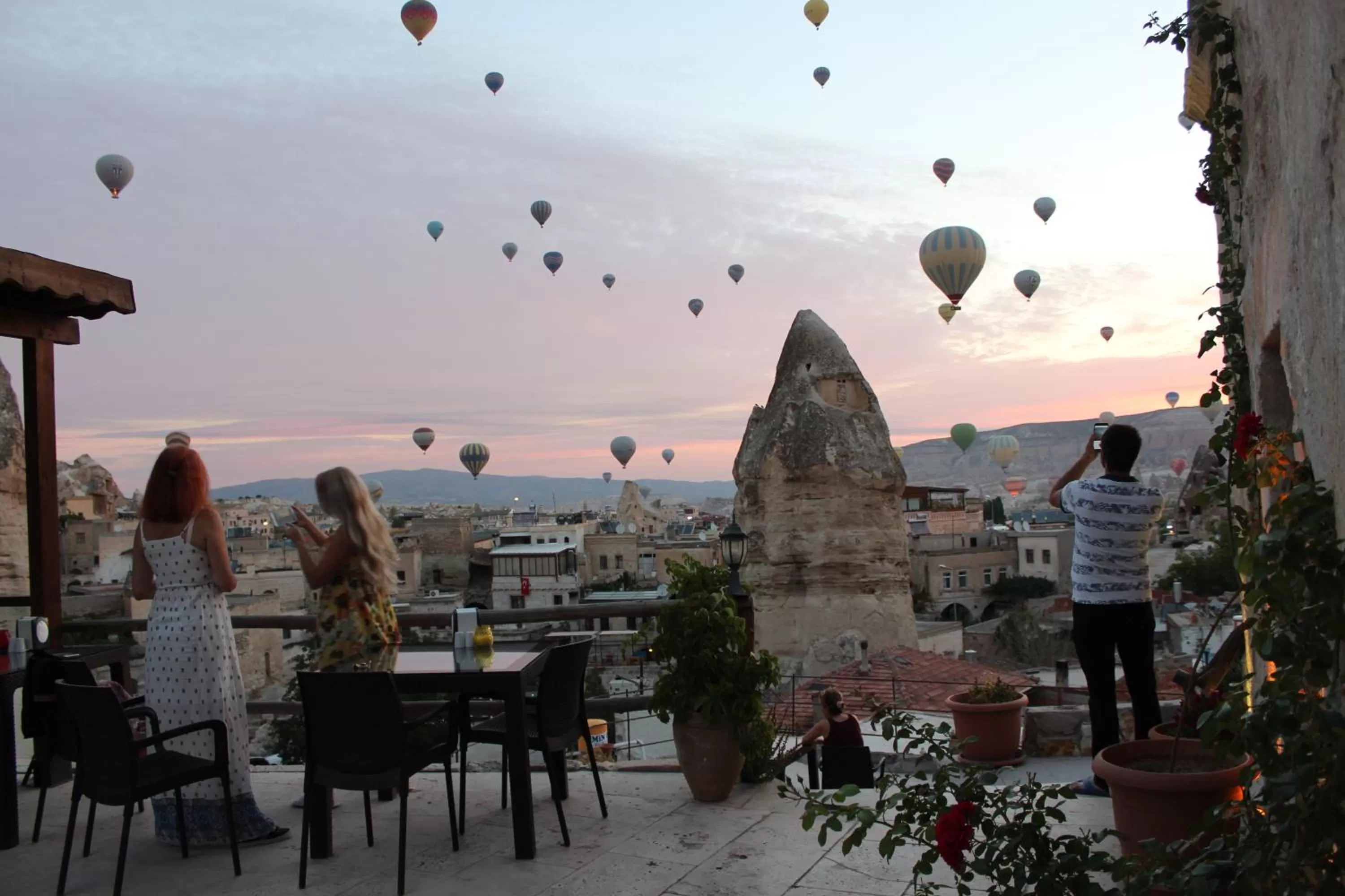 People in Shoestring Cave House