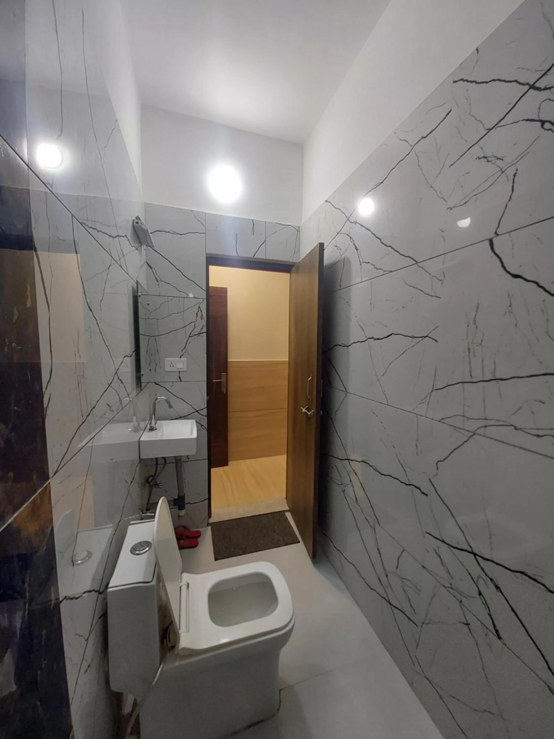 Bathroom in Taj Nice Point Manage by Taj Sunrise Group