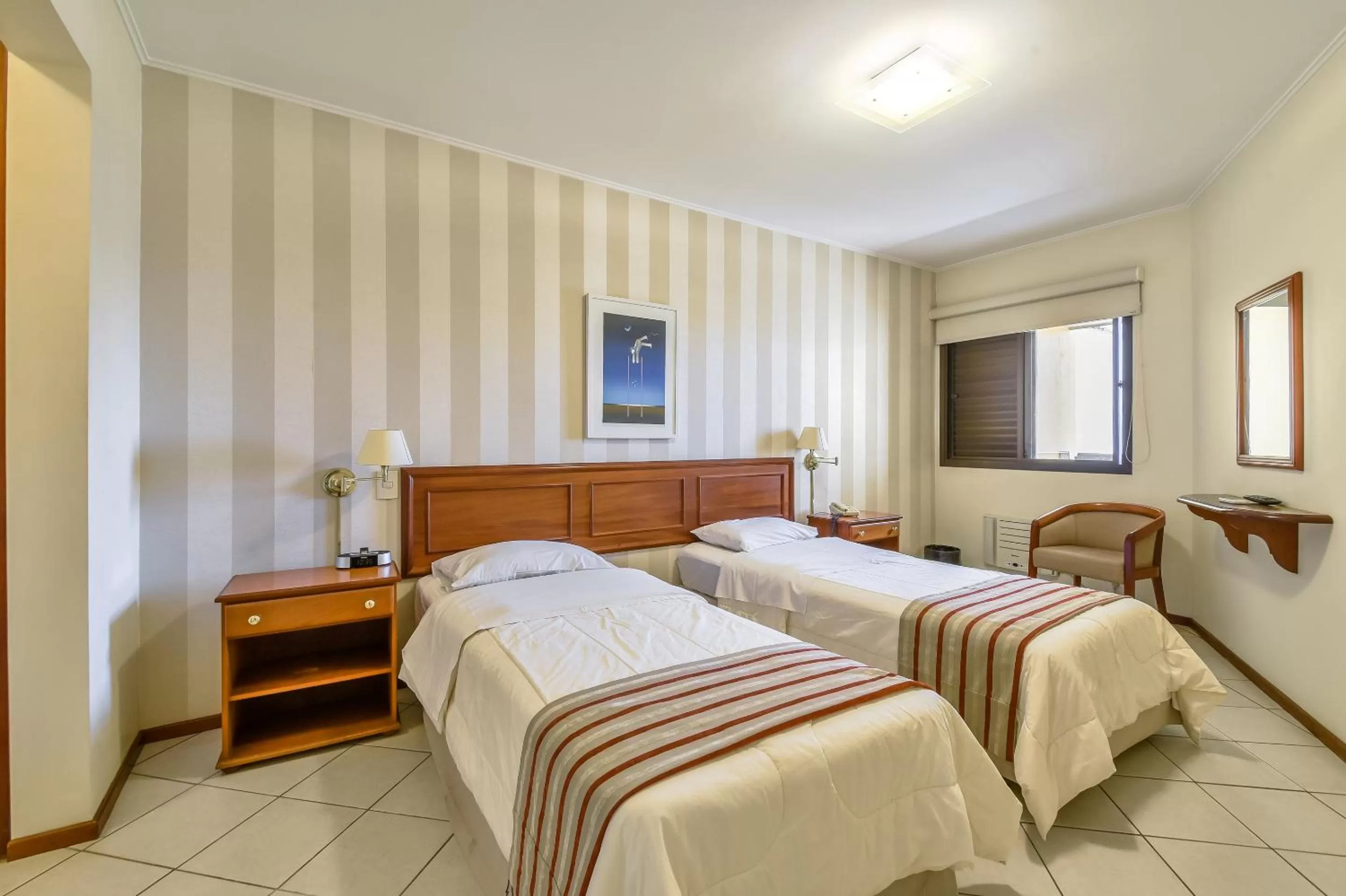 Bedroom, Bed in Park Tower Campinas Residence by Nacional Inn