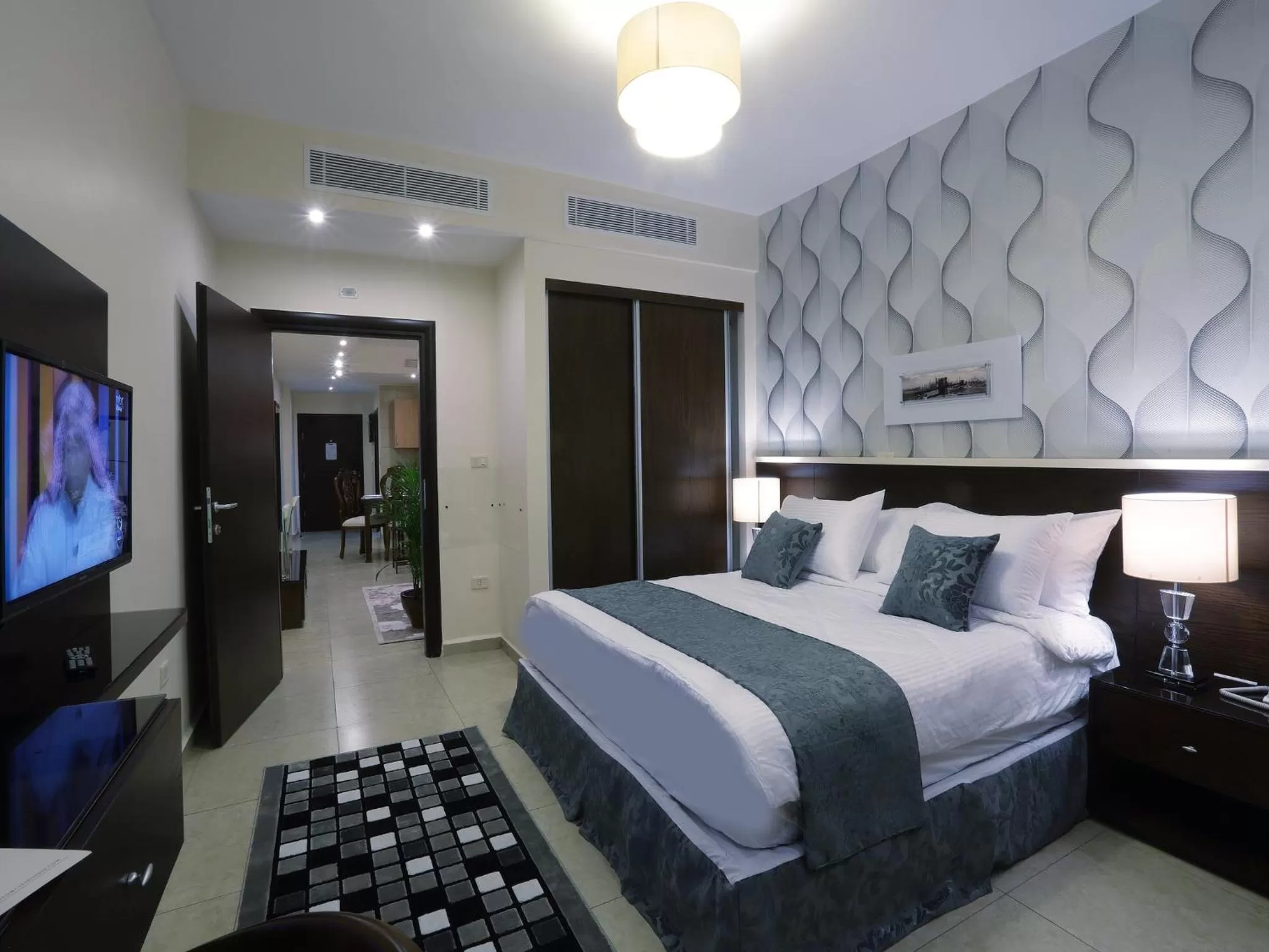 Bedroom, Bed in City Rose Hotel Suites