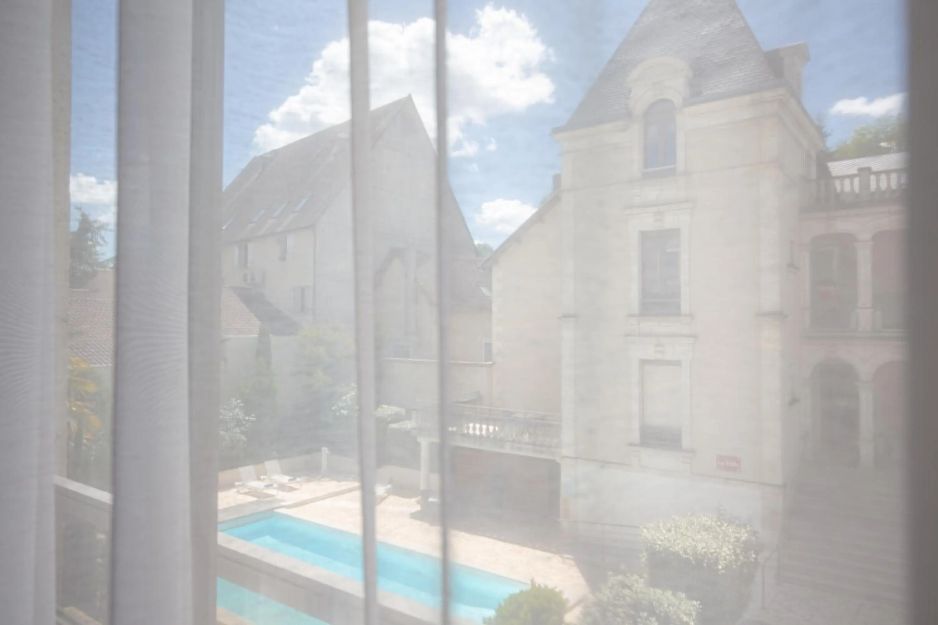 Property building in Hotel Le Renoir