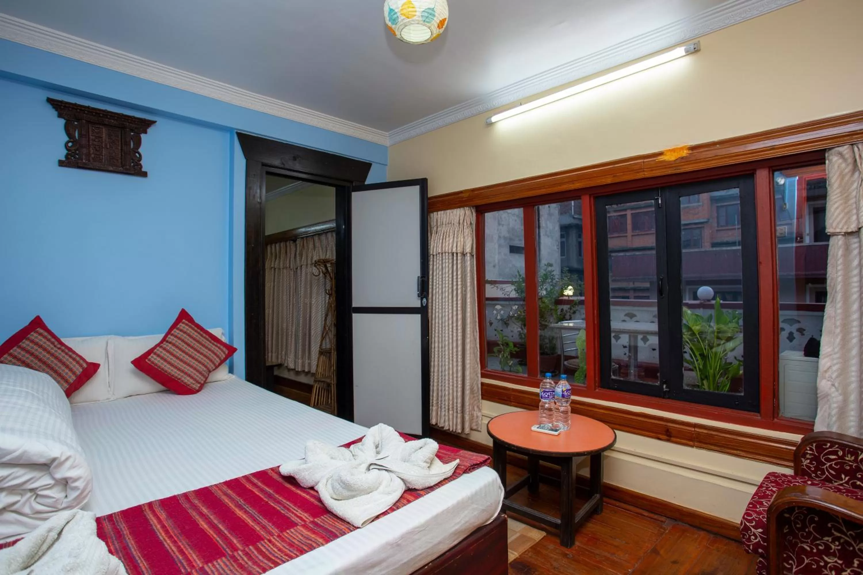 Photo of the whole room, Bed in Kathmandu Boutique Hotel