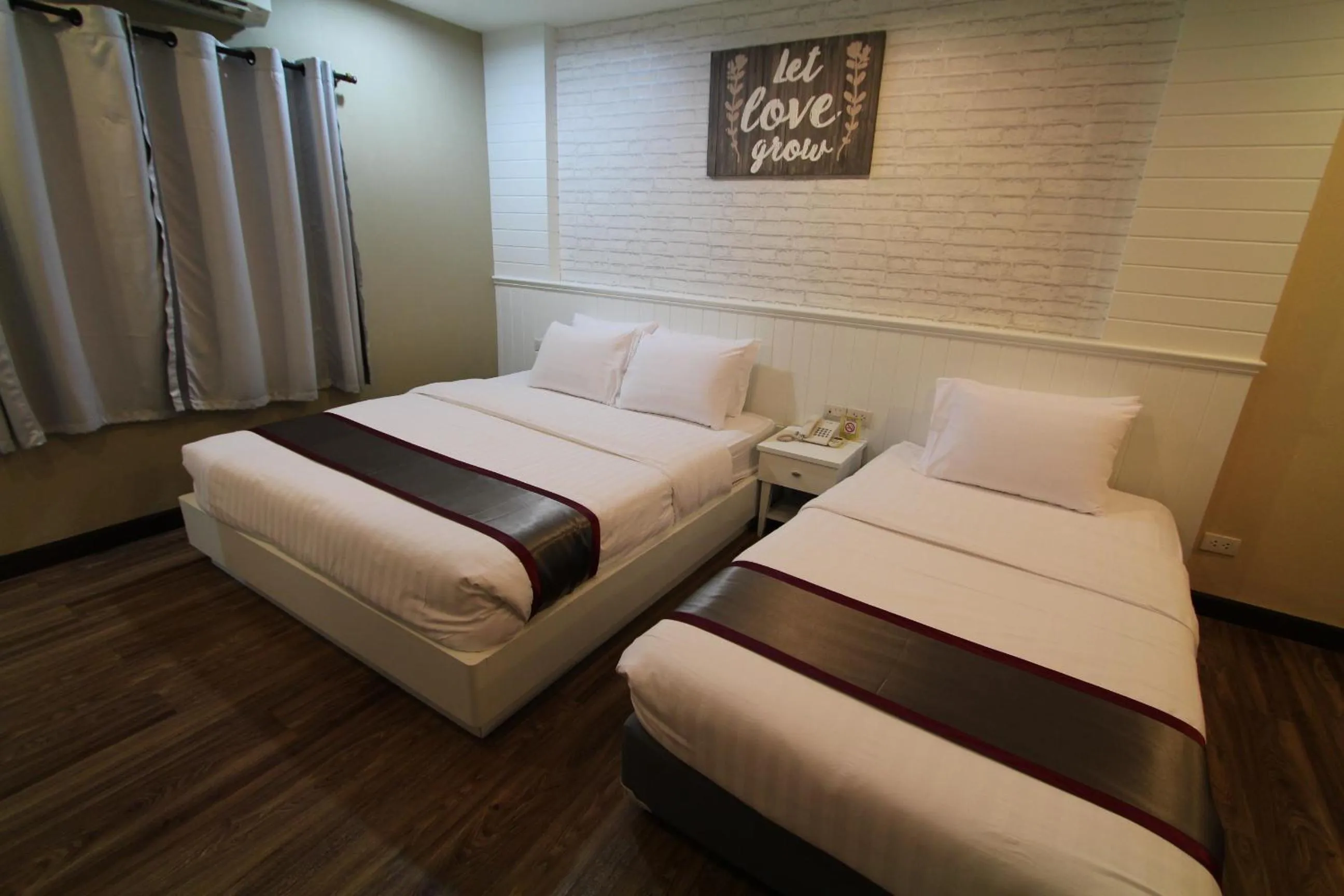 Bed in At Residence Suvarnabhumi Hotel