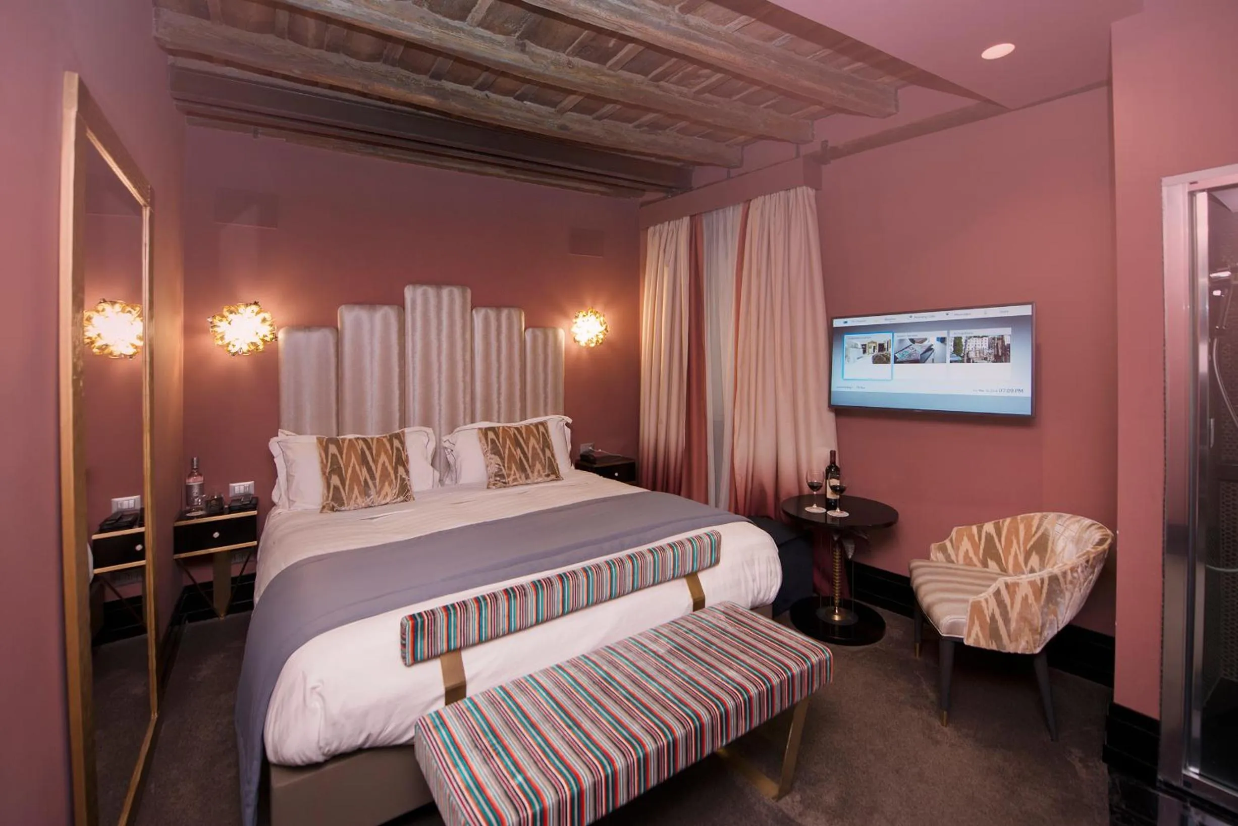 Bed in Torre Argentina Relais - Residenze di Charme