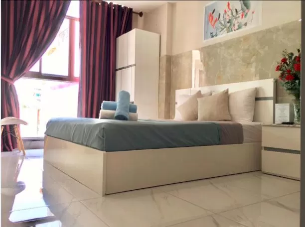 Bed in SaiGon CoZy Hotel "241 Pham Ngu Lao Street''