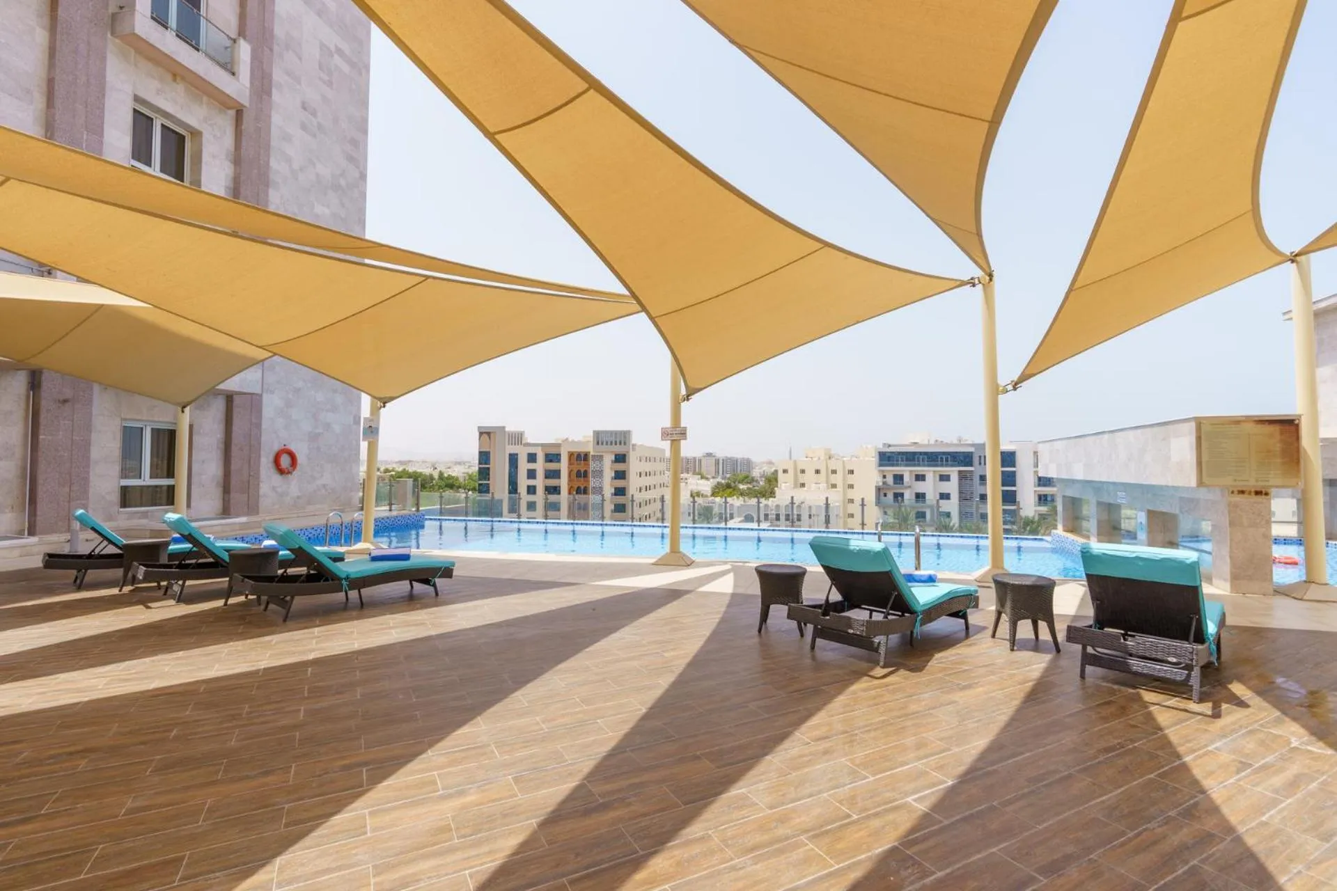 Swimming pool in Levatio Suites Muscat, a member of Radisson Individuals