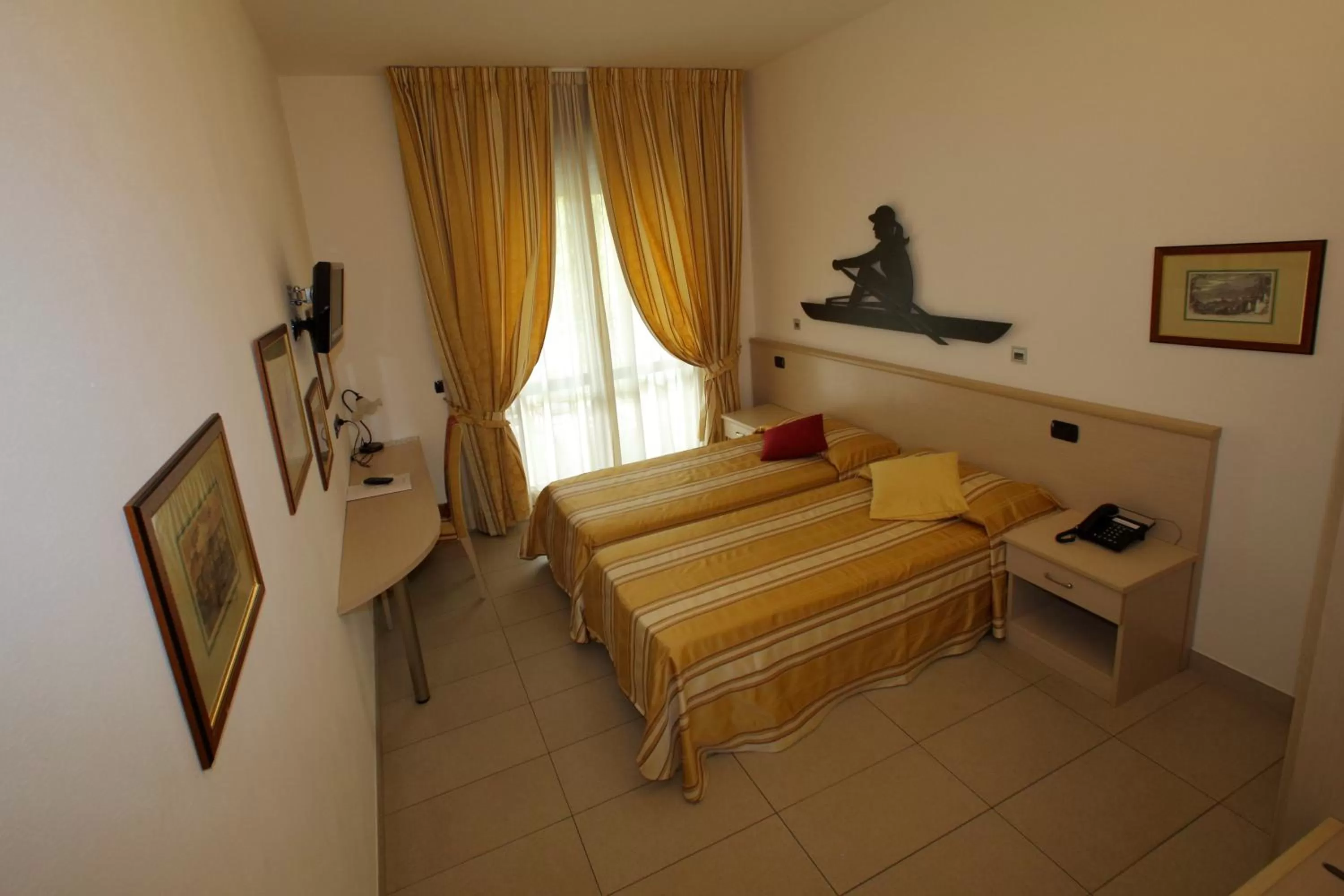 Photo of the whole room, Bed in Hotel Fioroni