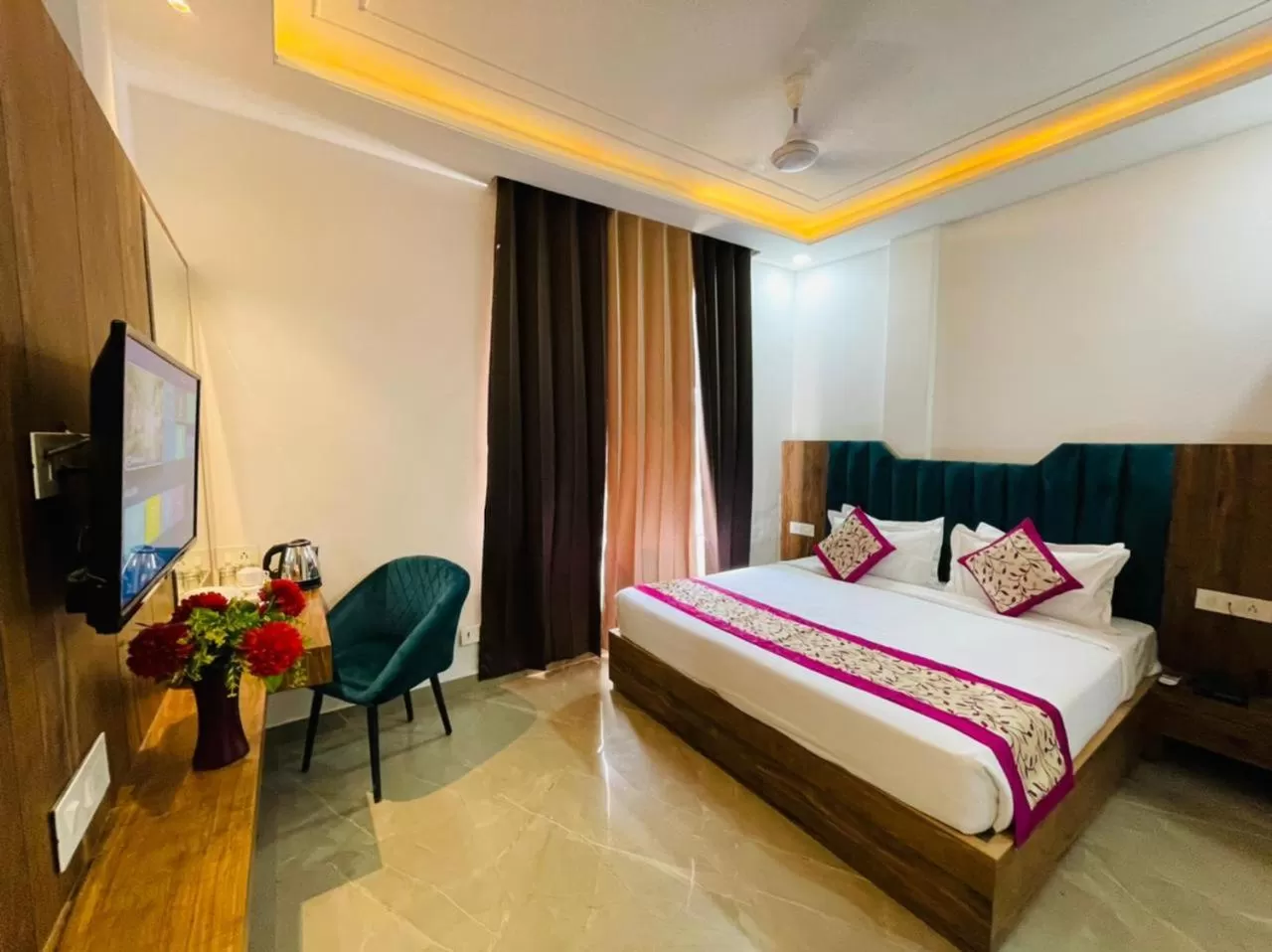 Photo of the whole room in Hotel Dream Town By Cozy Hotels & Resorts