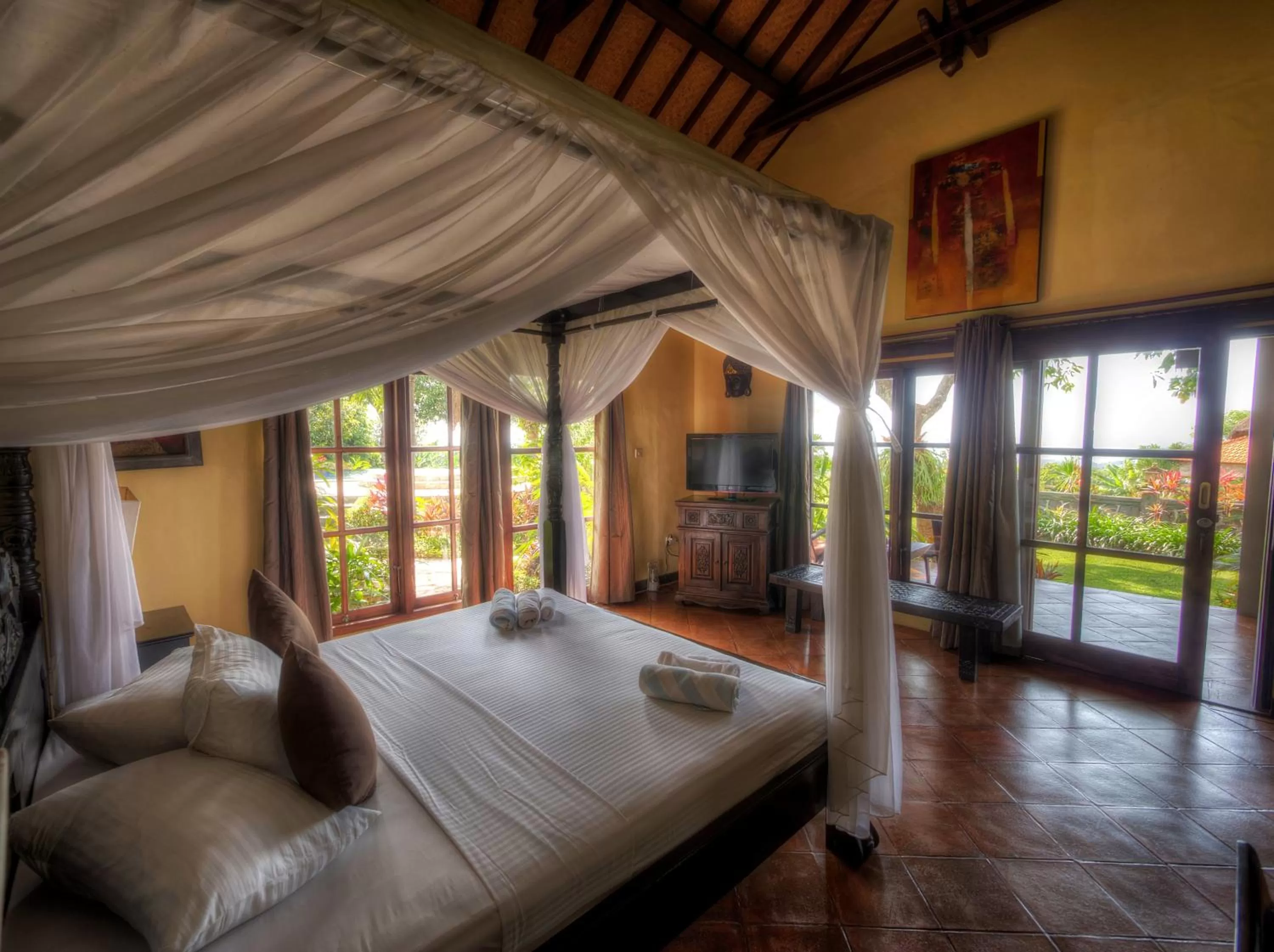 Photo of the whole room, Bed in Puri Mangga Sea View Resort and Spa