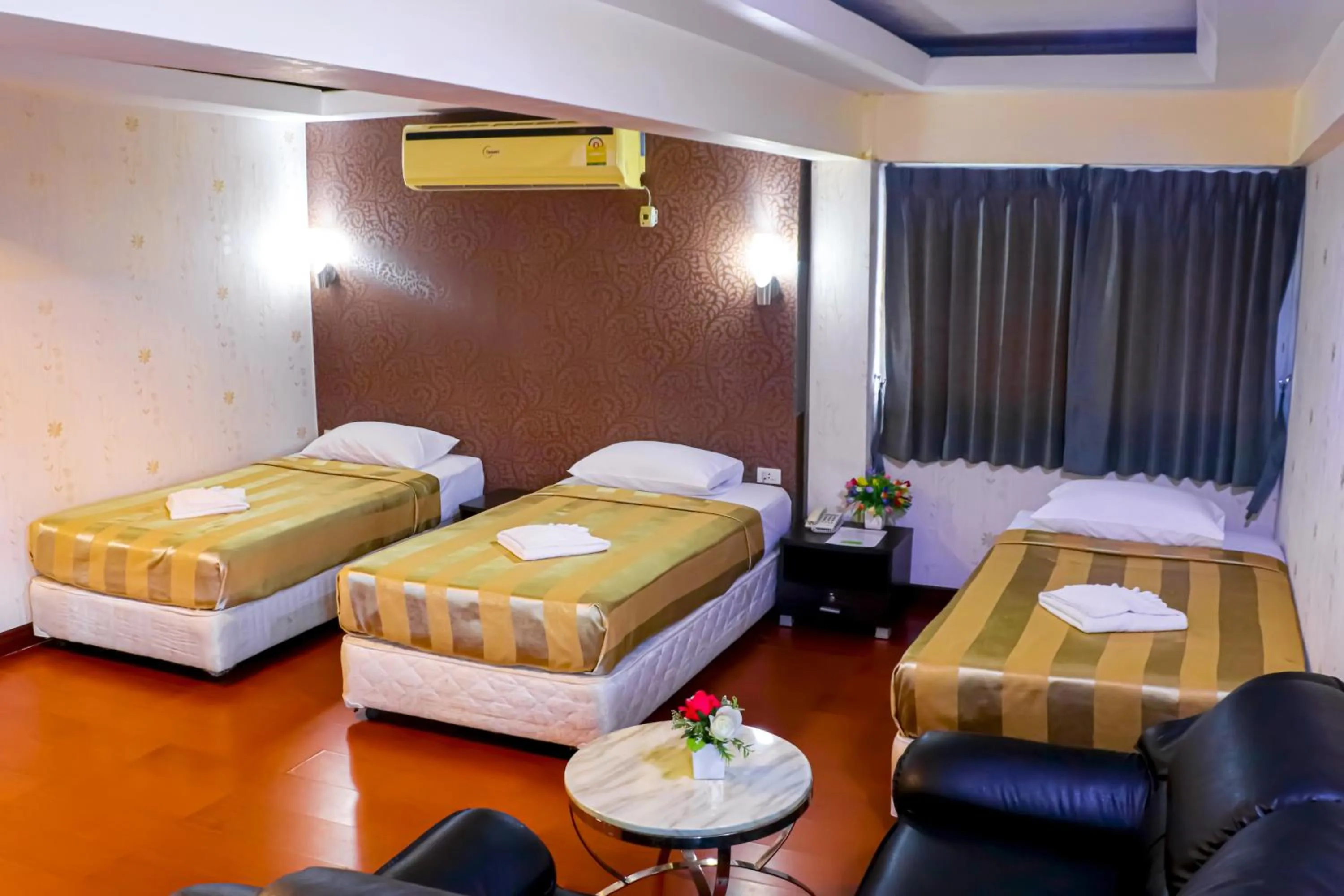 Bed in Visiting Card Hotel & Resort