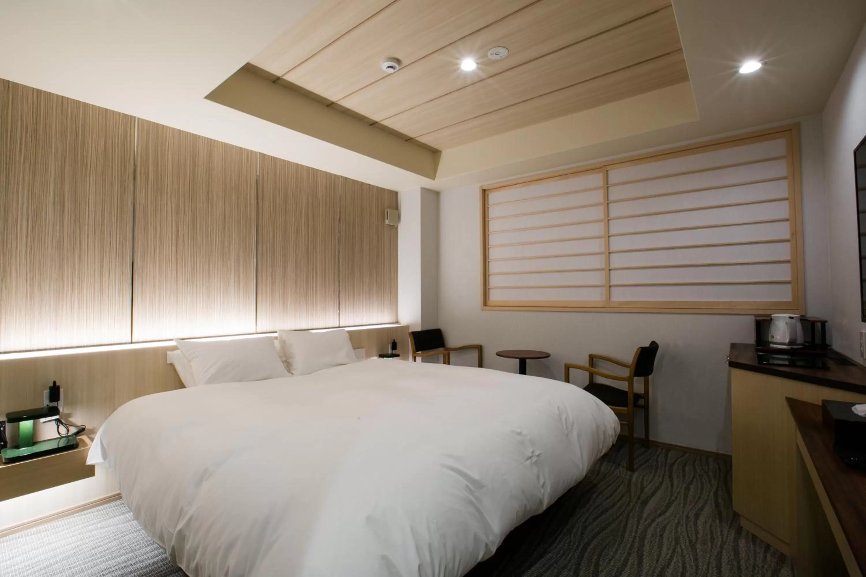 Living room, Bed in Kyoto Kamanza Hotel