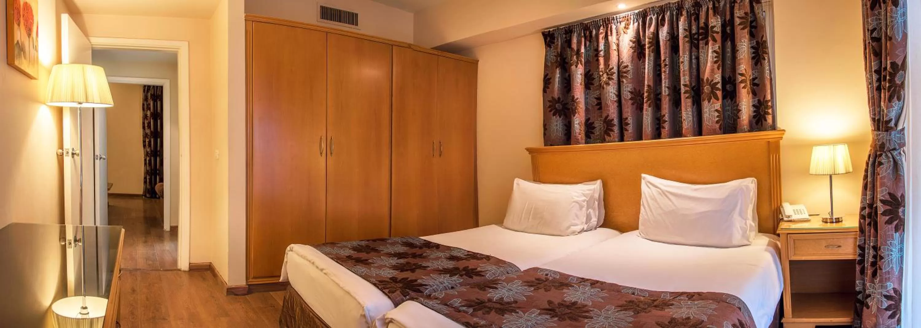 Bed in Bella Riva Hotel