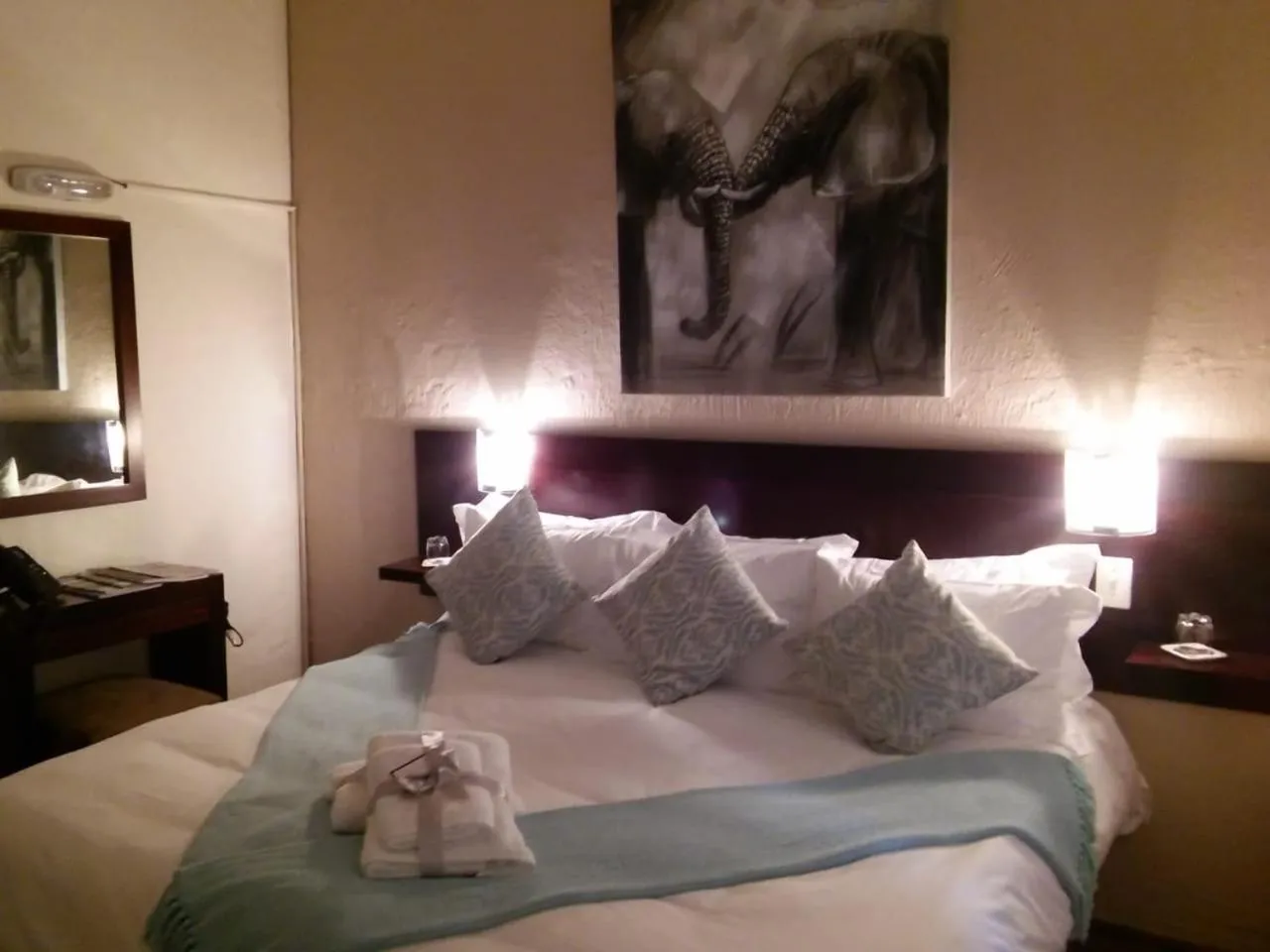 Bed in Point B Guest House -Sustainable Solar Energy