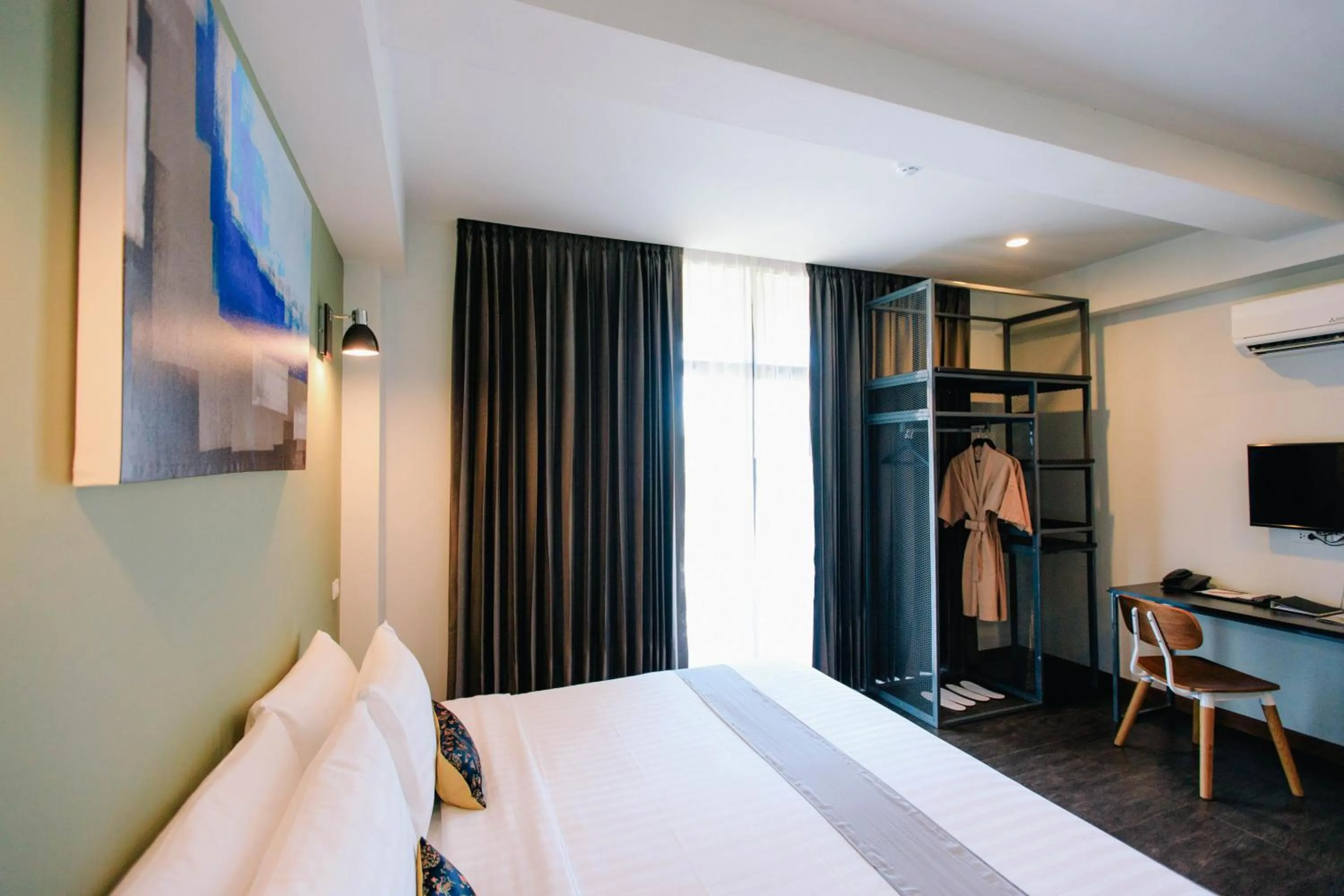 Bed in Wealth Boutique Hotel Chiang Mai