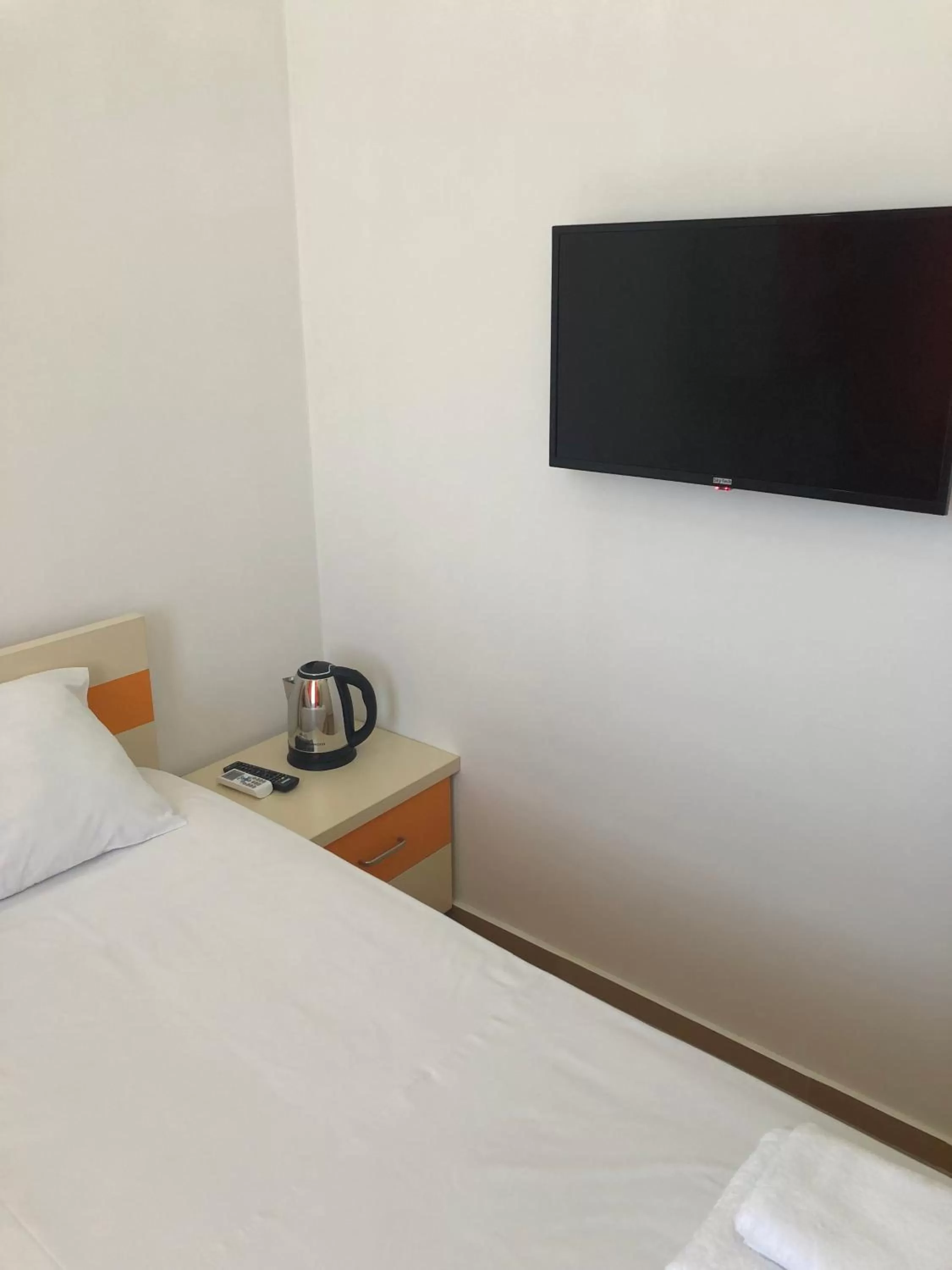 TV/Entertainment Center in Orange Home Hotel