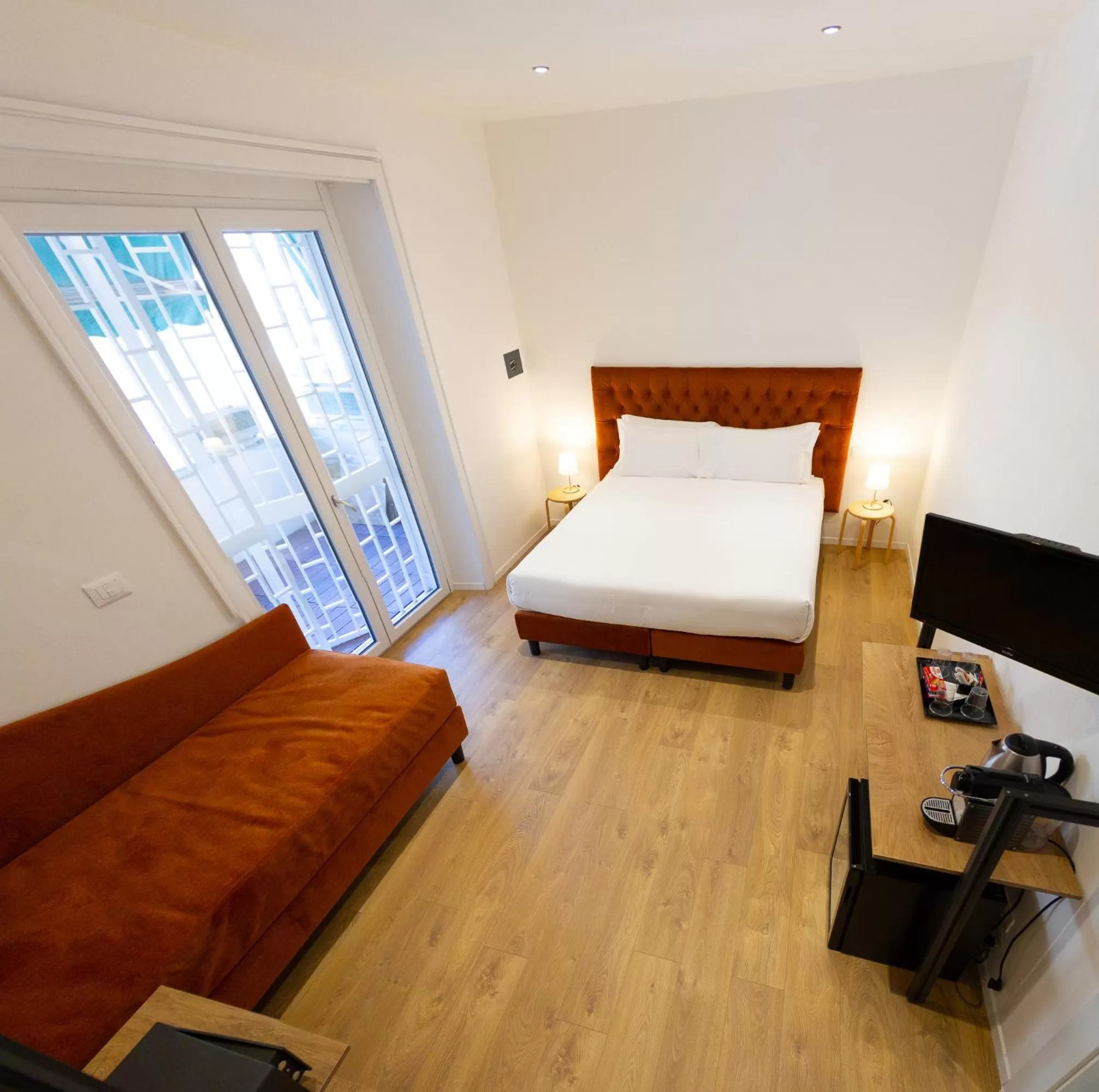 Bed in Michelangelo Vatican Rooms