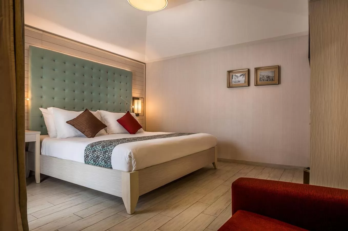 Bed in Astral Village Hotel