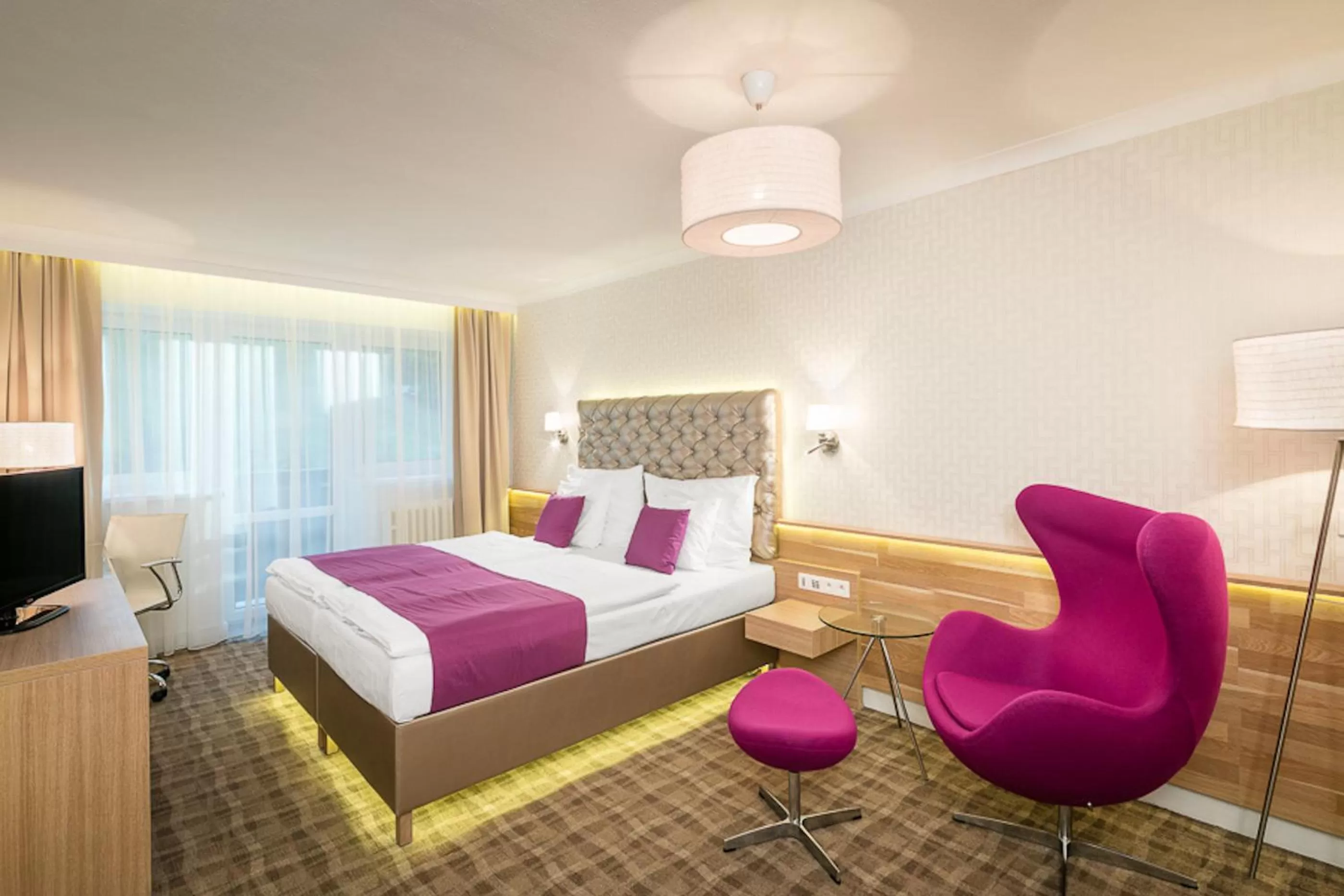 Bed in Pytloun Wellness Hotel Harrachov