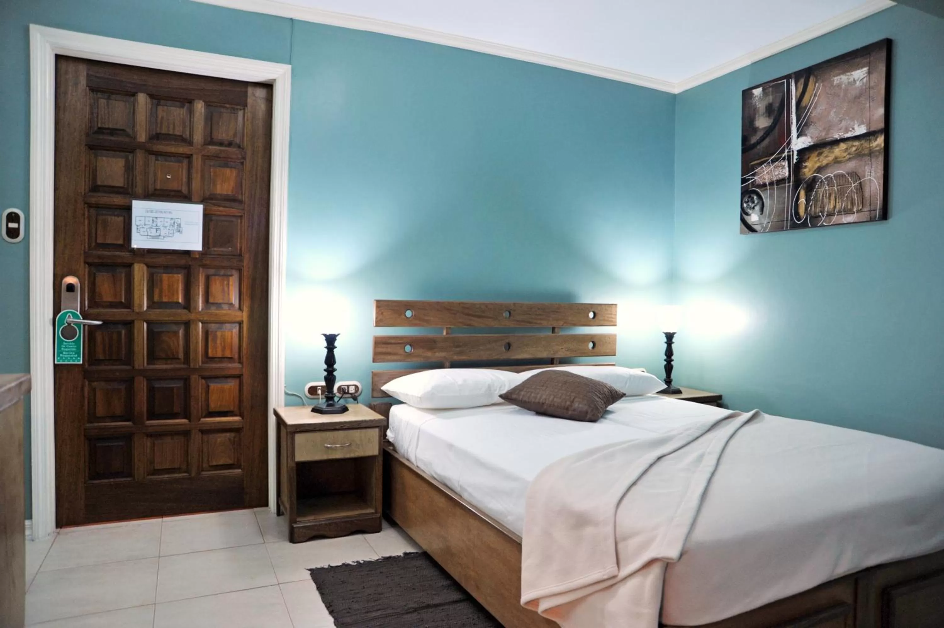 Bed in Culture Crossroads Inn