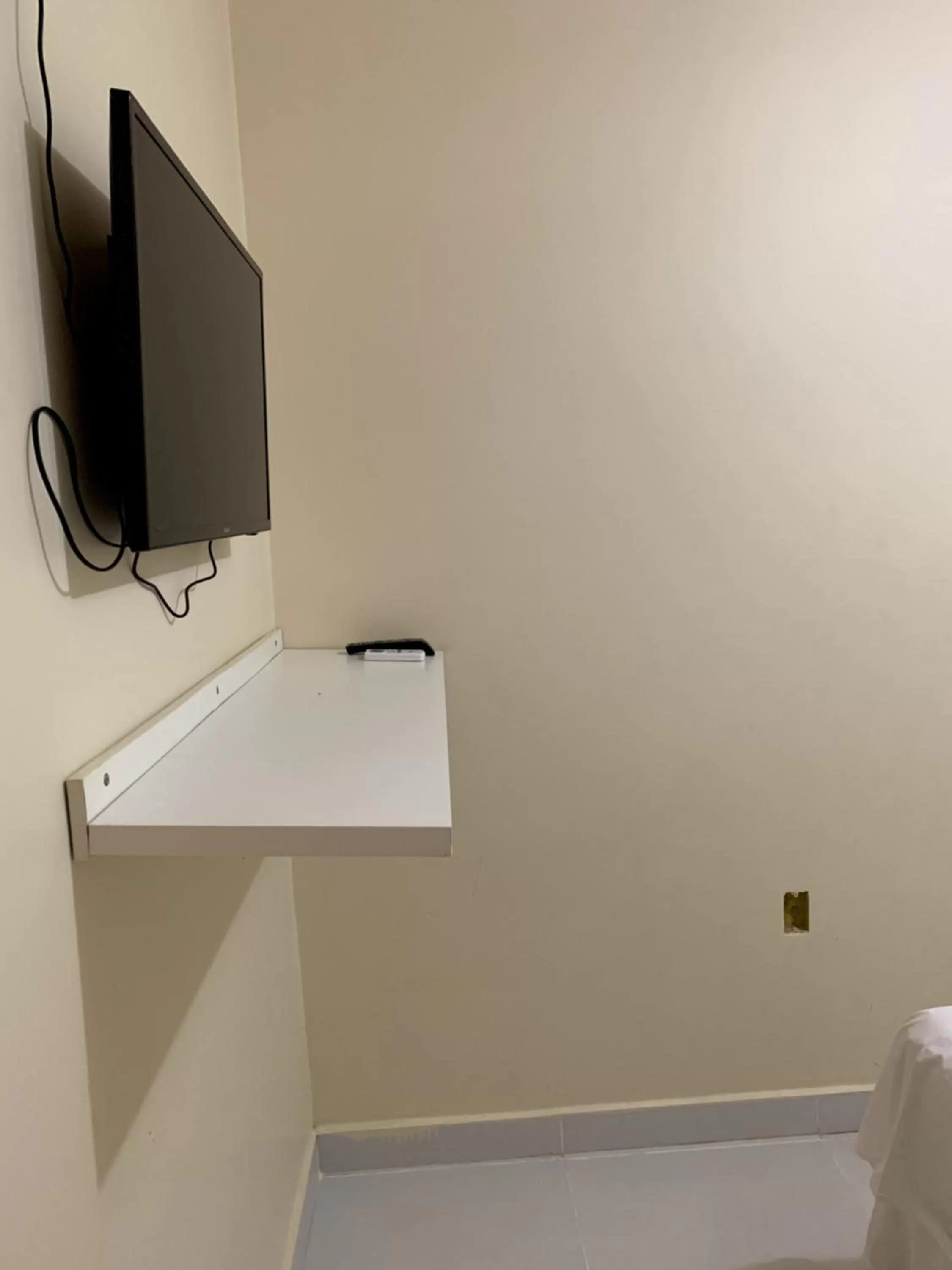 TV/Entertainment Center in Pousada Jardim Brasília