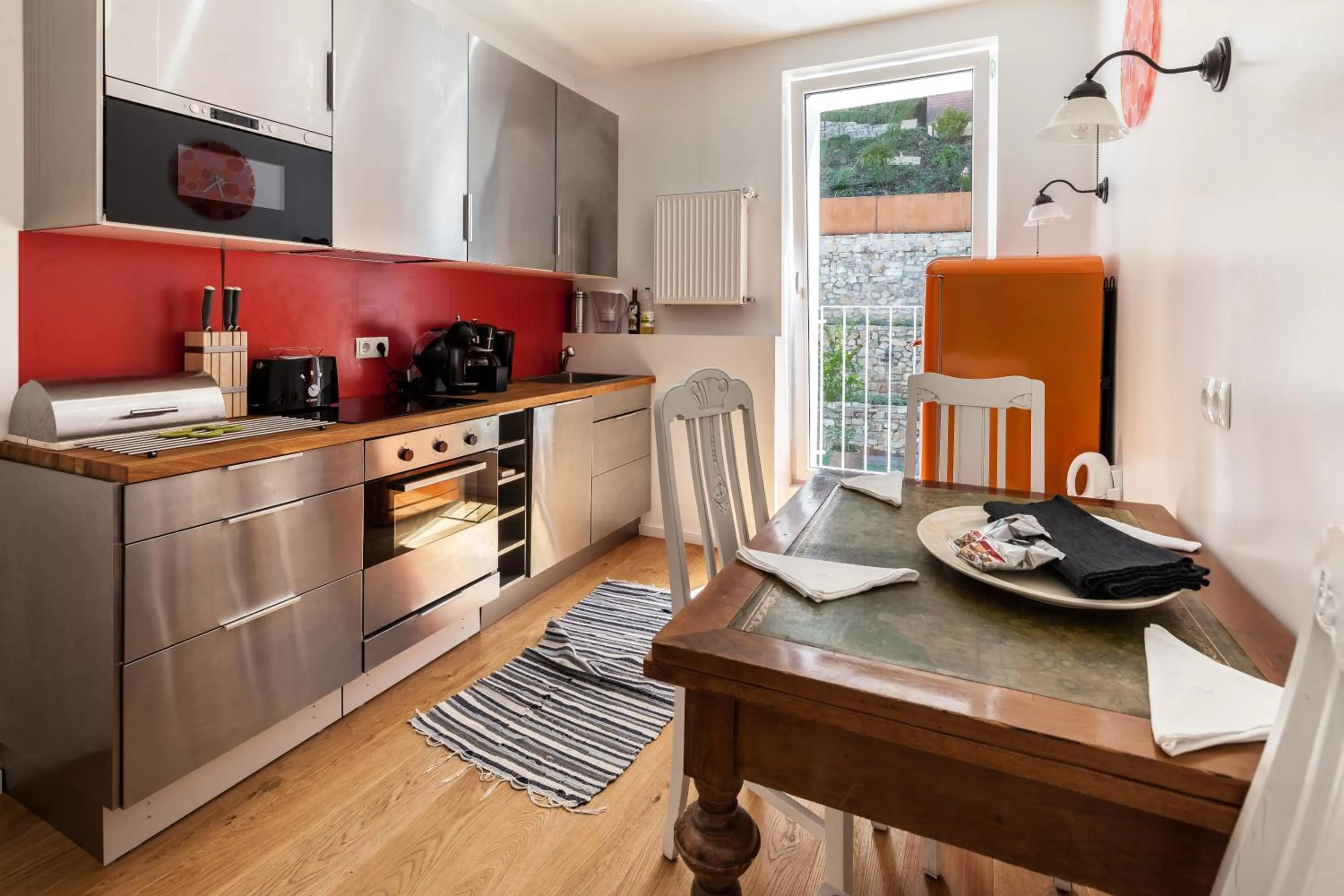 Kitchen or kitchenette in GL Suites