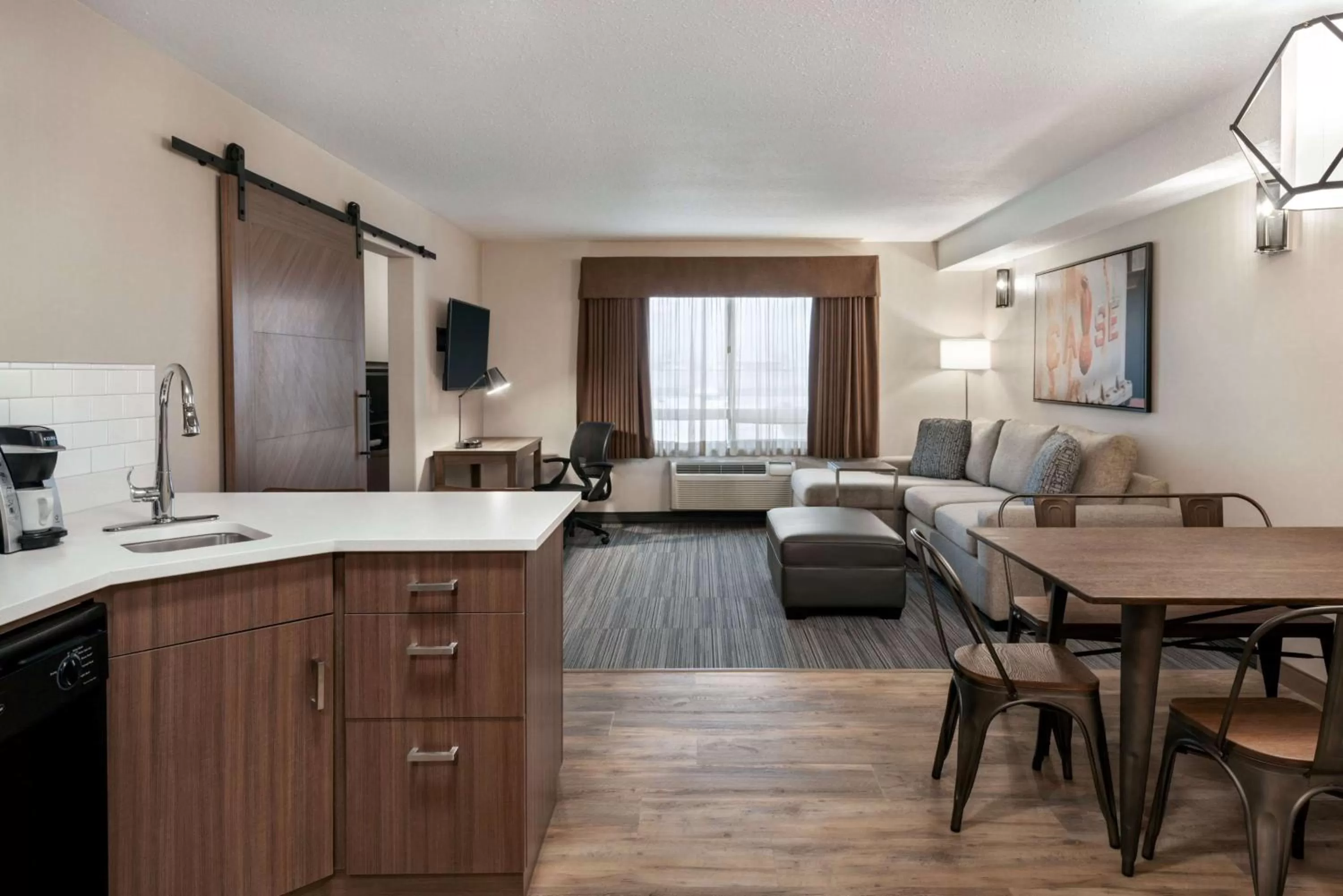 Photo of the whole room in Ramada by Wyndham Airdrie Hotel & Suites