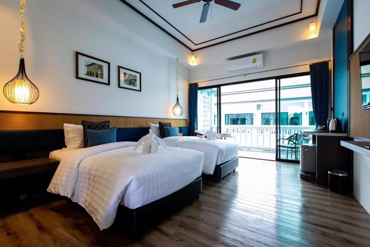 Bed in Chaanburi Boutique Resort