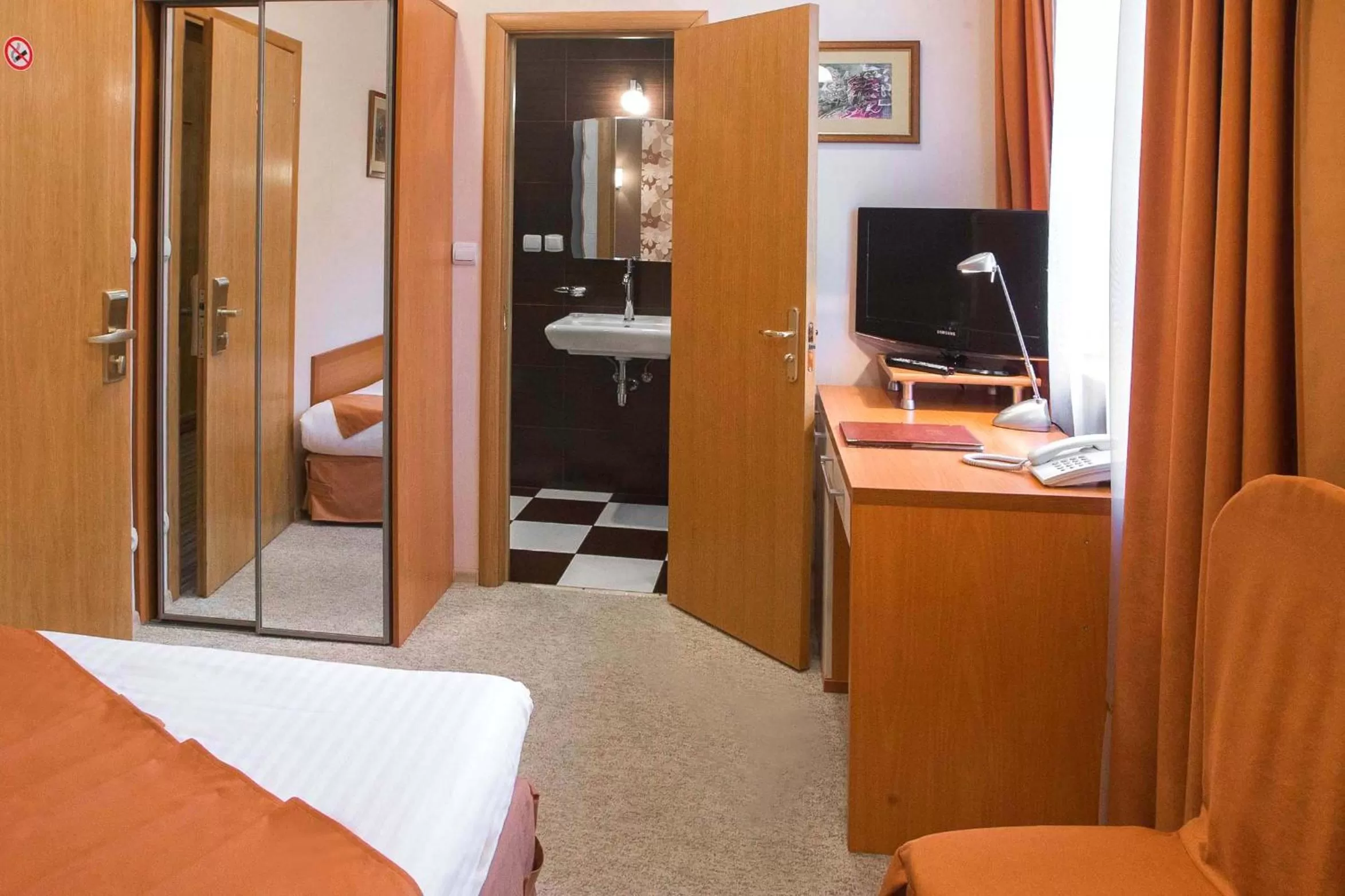 Photo of the whole room, TV/Entertainment Center in Economy room in Hotel Eney