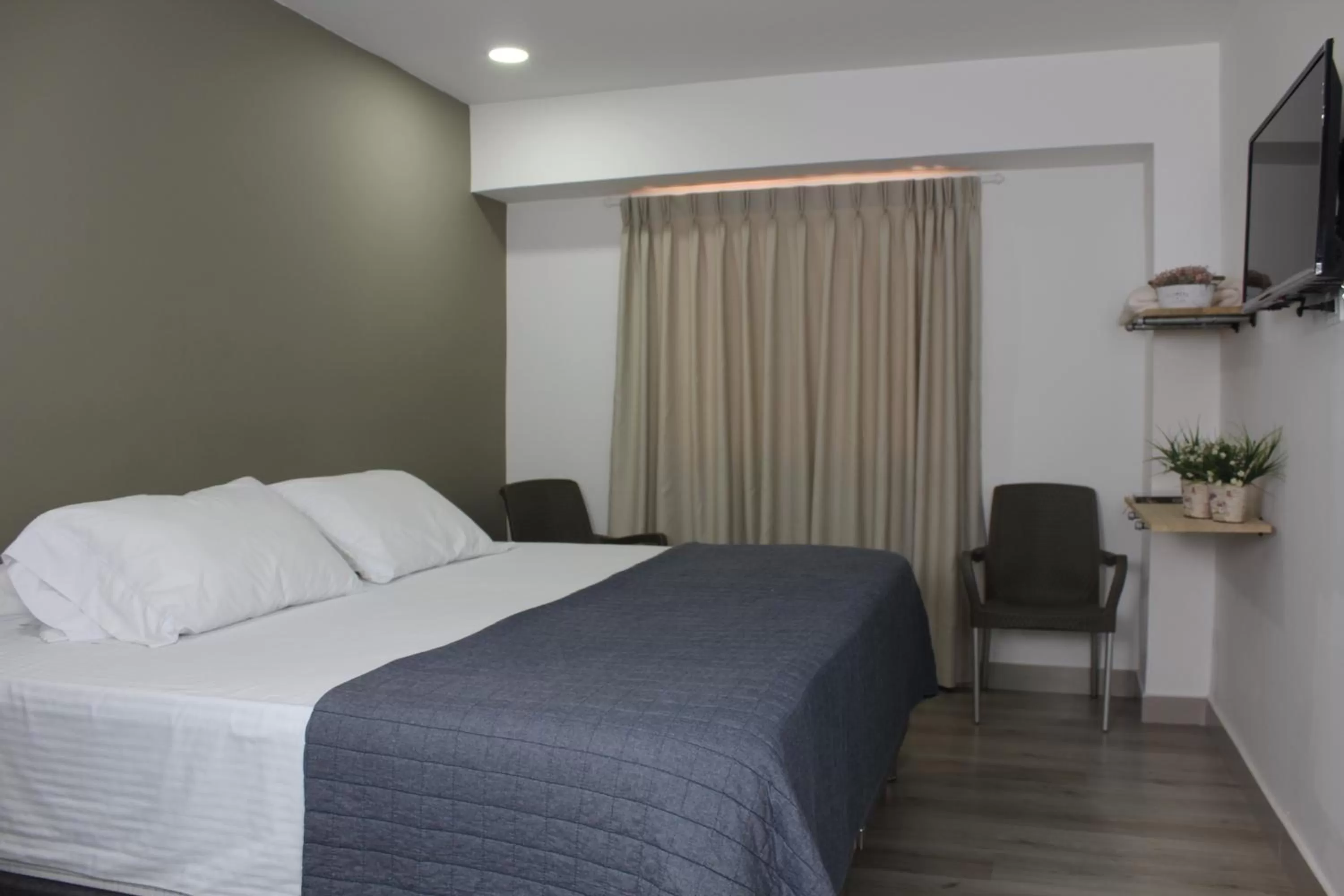 Bed in Hotel Boutique Plaza