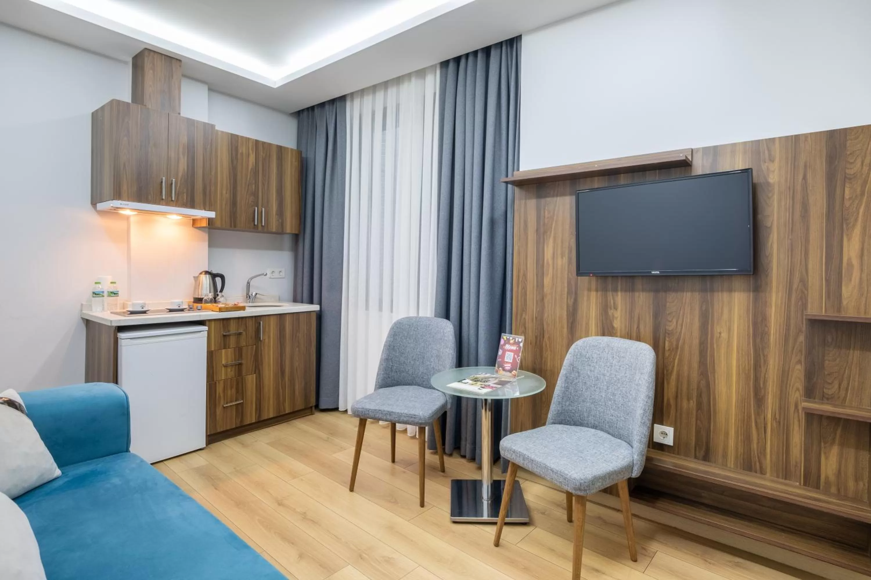 TV and multimedia, TV/Entertainment Center in Beyzas Hotels & Suites