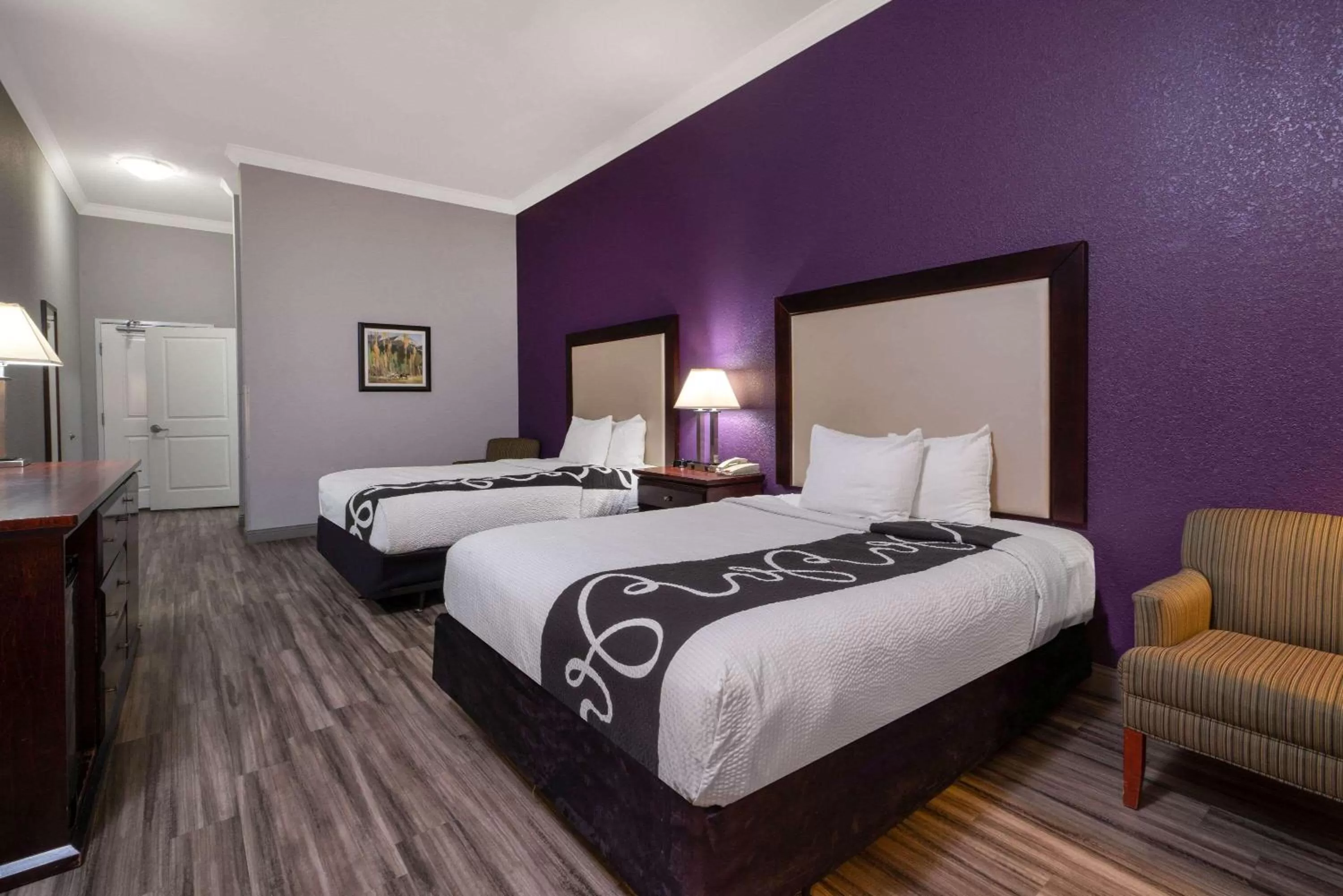 Bed in La Quinta Inn & Suites by Wyndham Loveland Estes Park