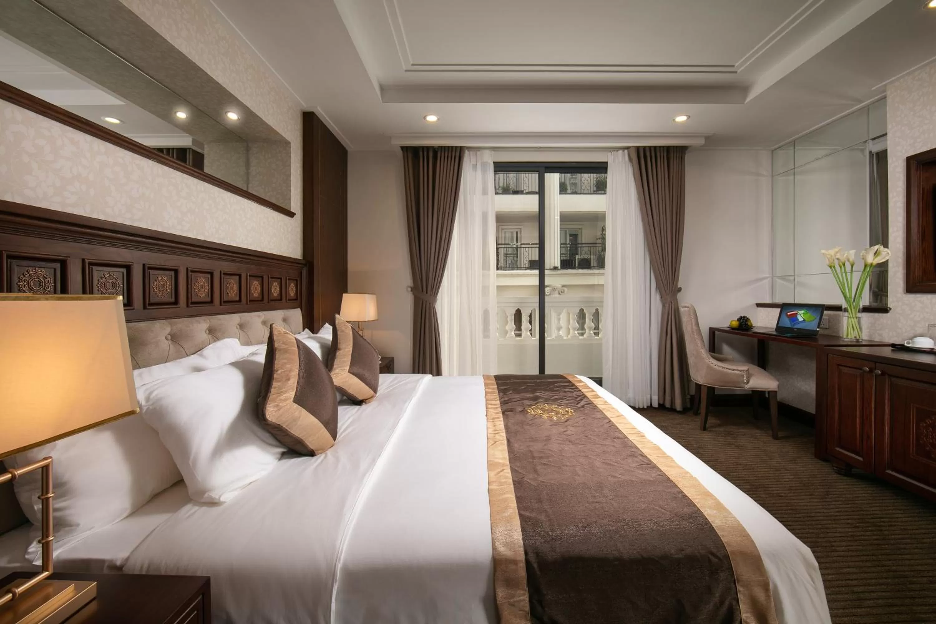 Bed in Rex Hanoi Hotel