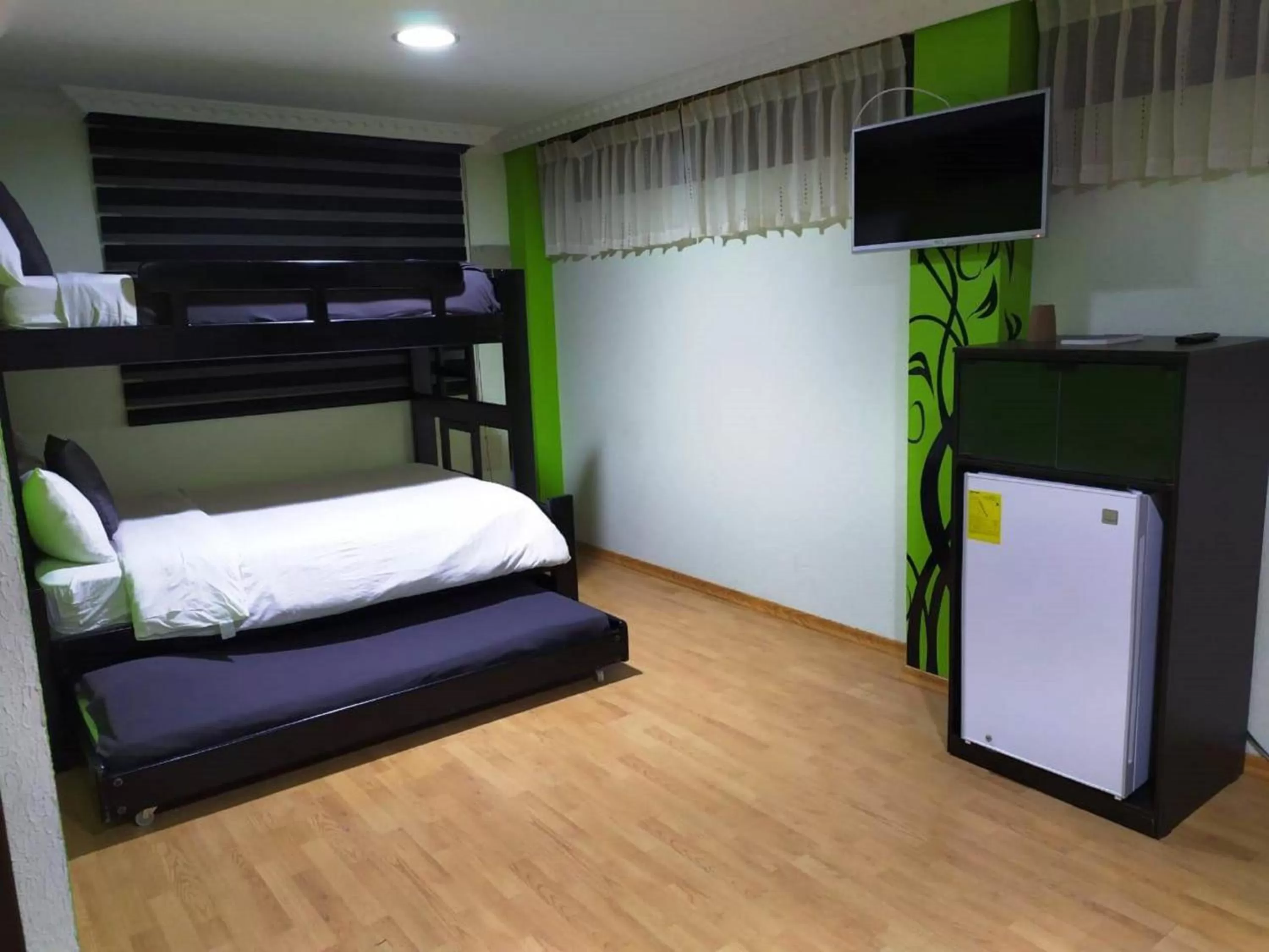 Bedroom, Bunk Bed in La Kapital Hotel