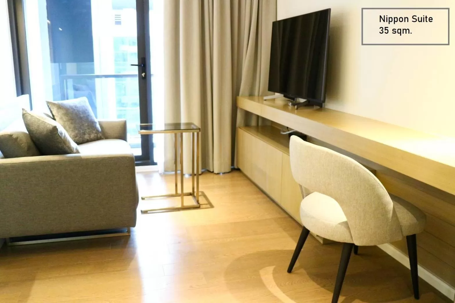 Living room in ashley hotel bkk