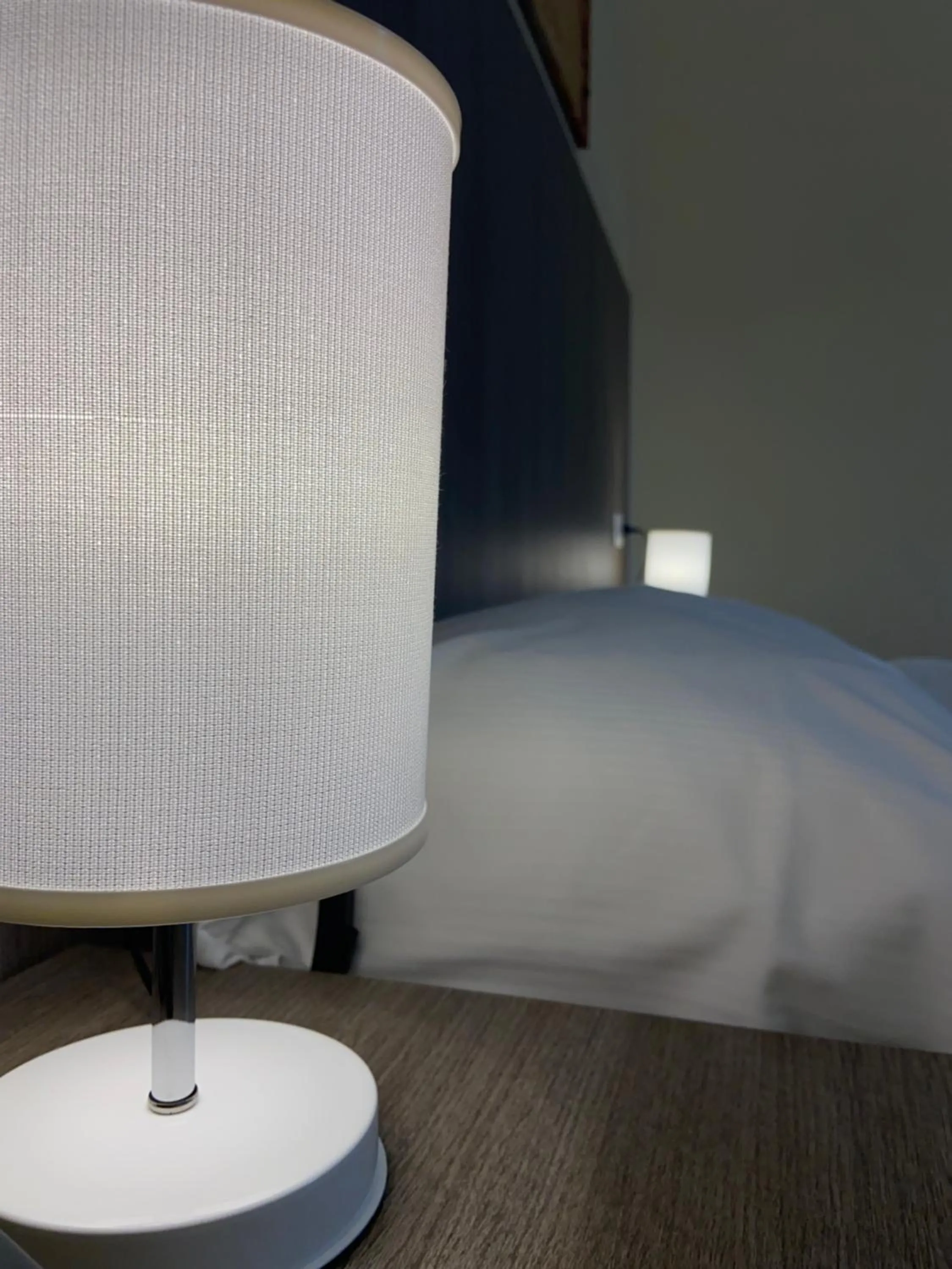 Bed in 55 Aira Hotel