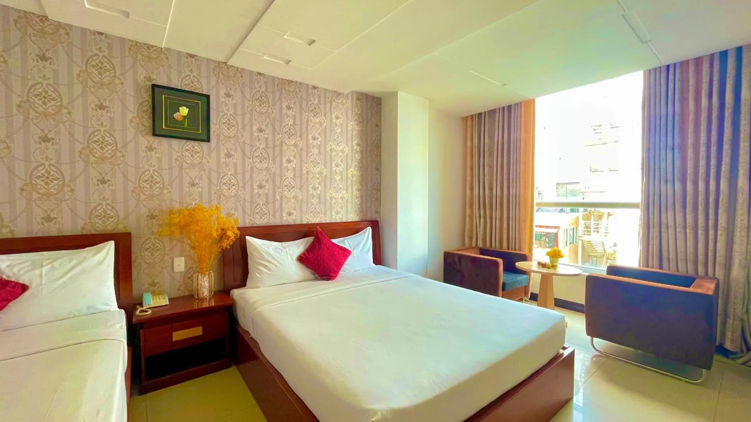 Seating area, Bed in Gold hotel, Saigon