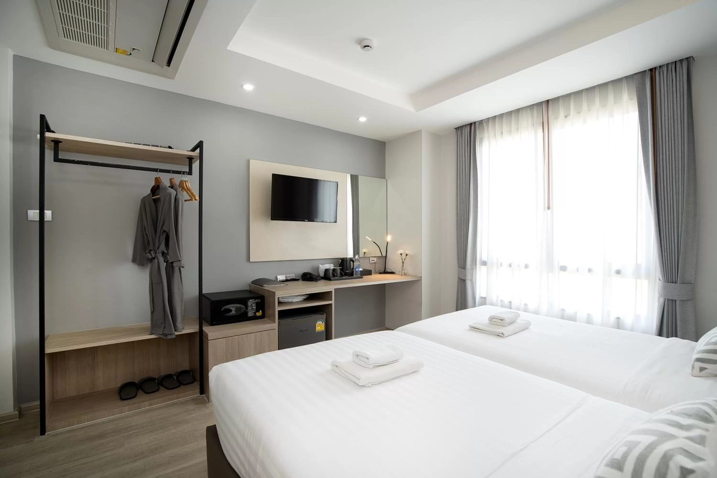 Bed in The Riski Hotel at Bangphlat Station SHA