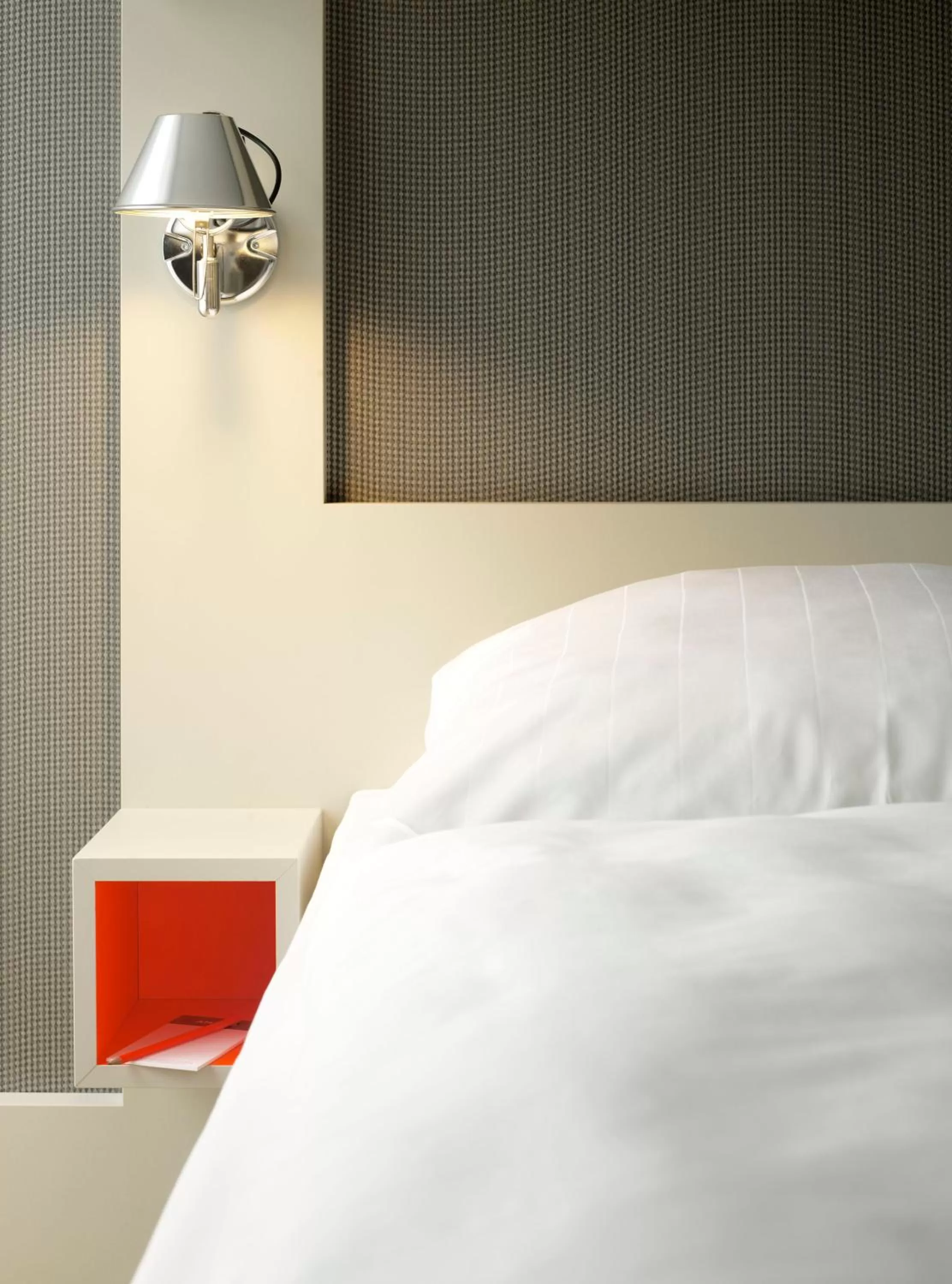 Bed in Hotel AMANO Rooms & Apartments