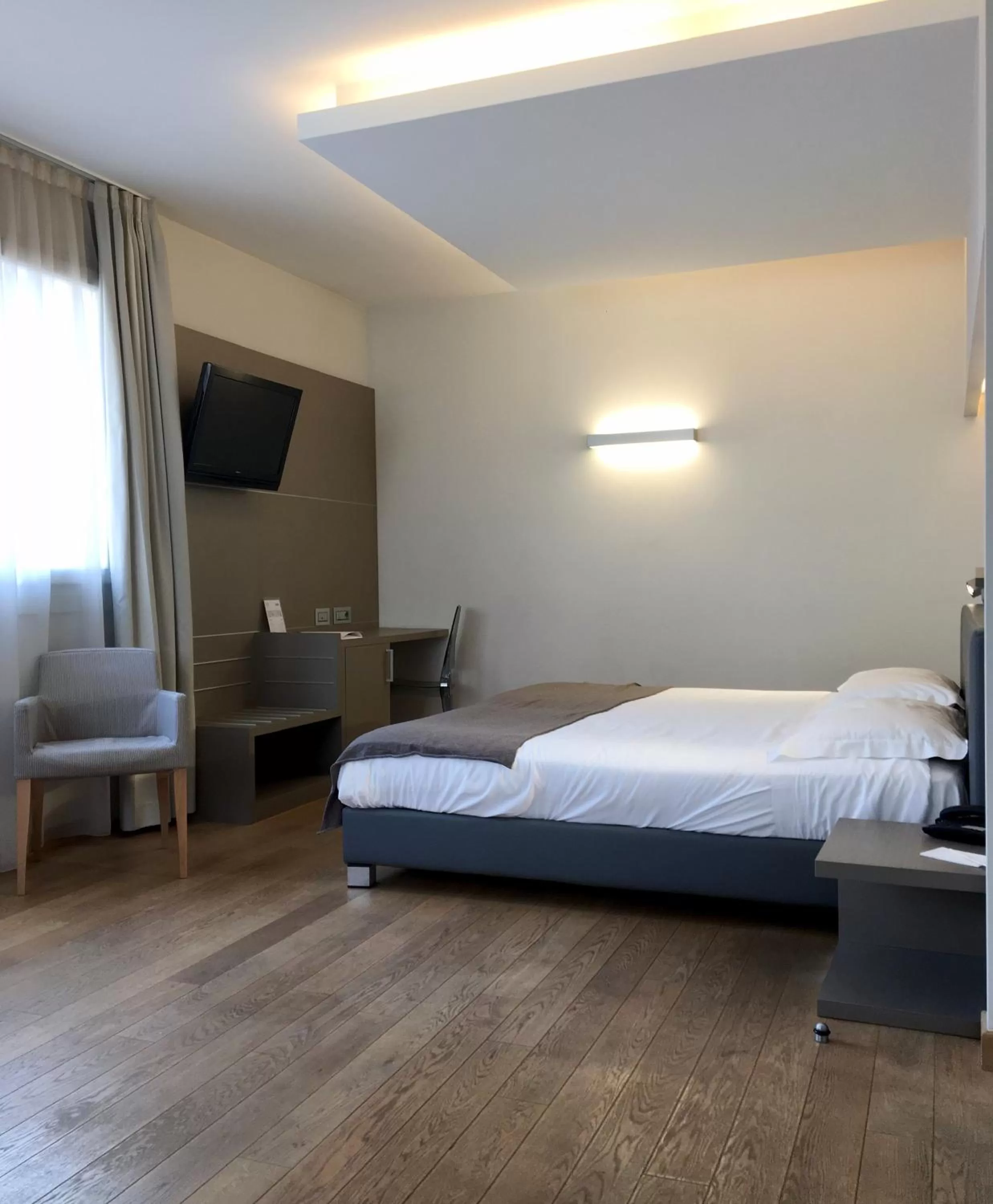 Photo of the whole room, Bed in Hotel Di Varese